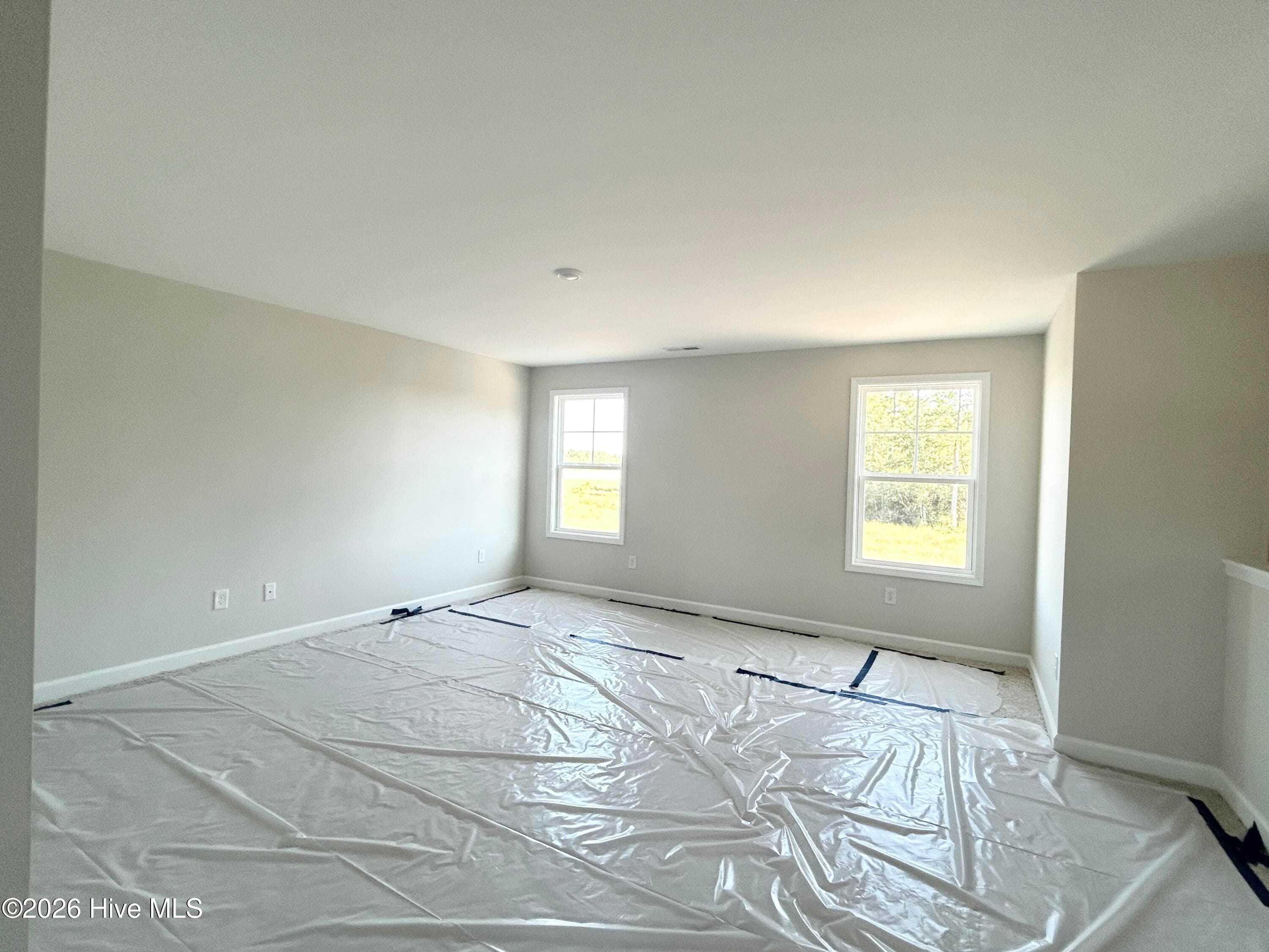 Primary suite features a Private Bathroom with Tile Shower and Large Walk-in Closet - 4192 Workman Loop 90, Leland, NC 28451