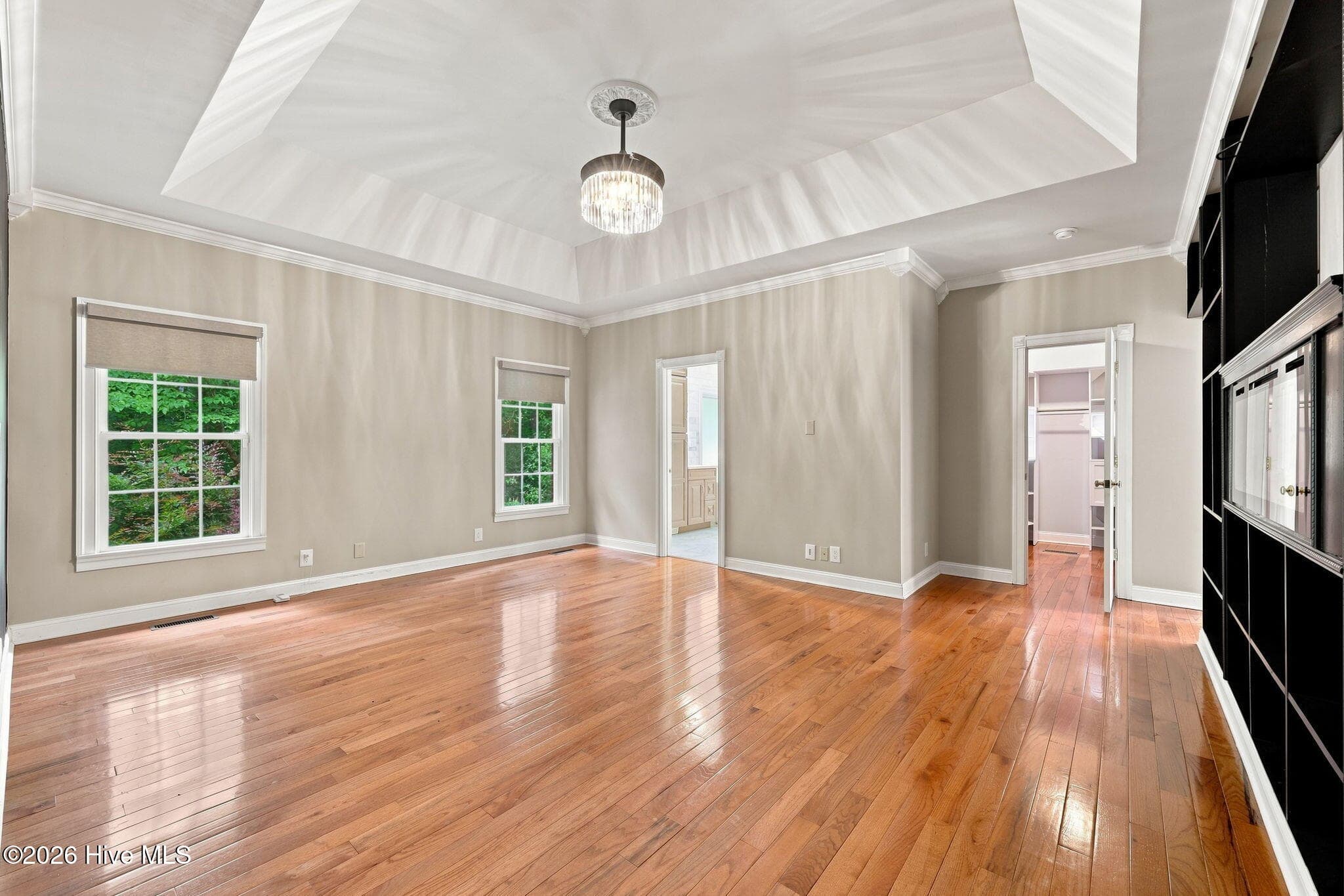 Primary bedroom suite with trey ceiling - 407 Rustic Court, Pollocksville, NC 28573