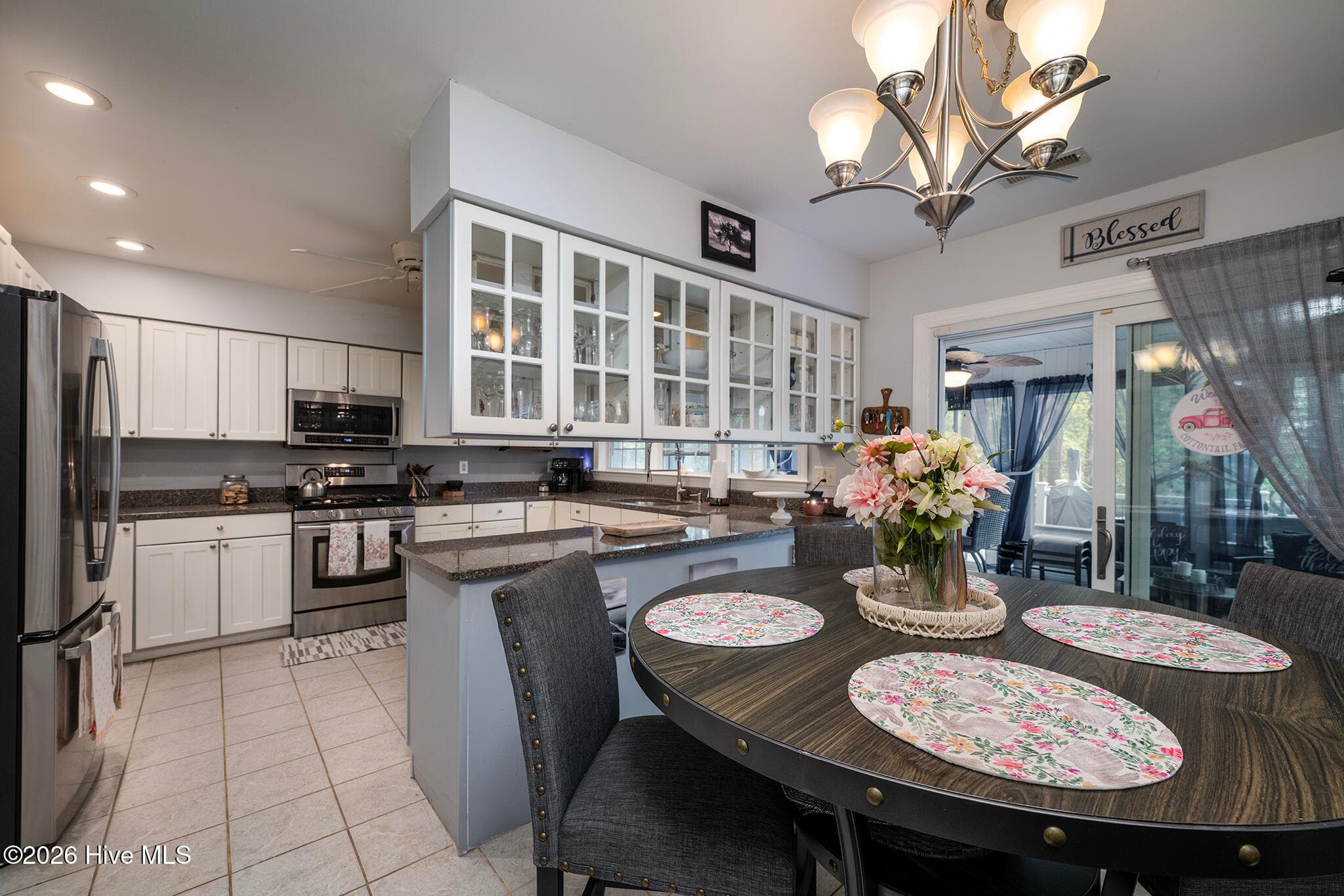 Beautiful Bright Kitchen Leading to an Enclosed Screen Porch - 106 Windlass Way, Aurora, NC 27806