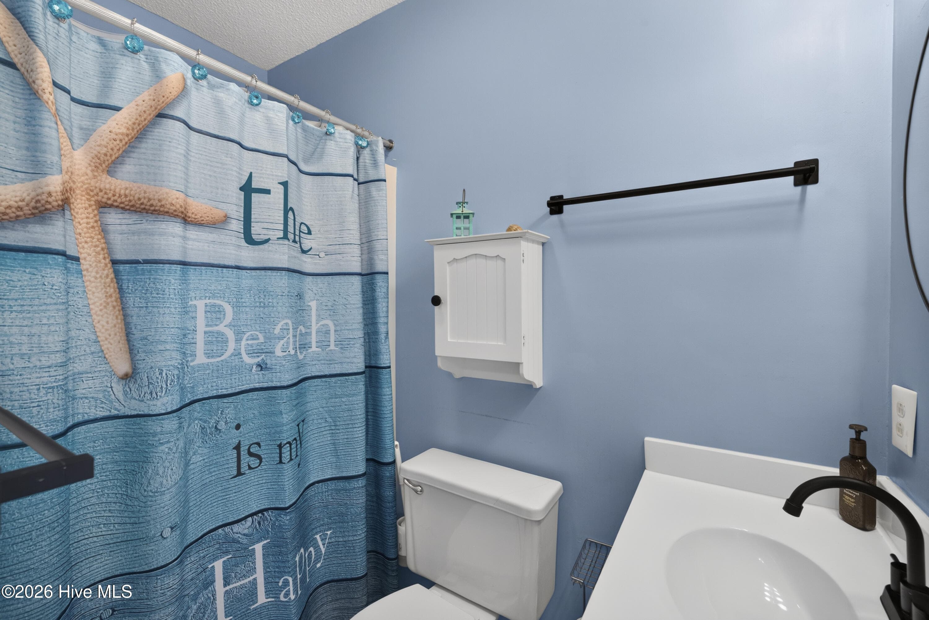 Upper level full bath - 301 Bay Circle, North Topsail Beach, NC 28460