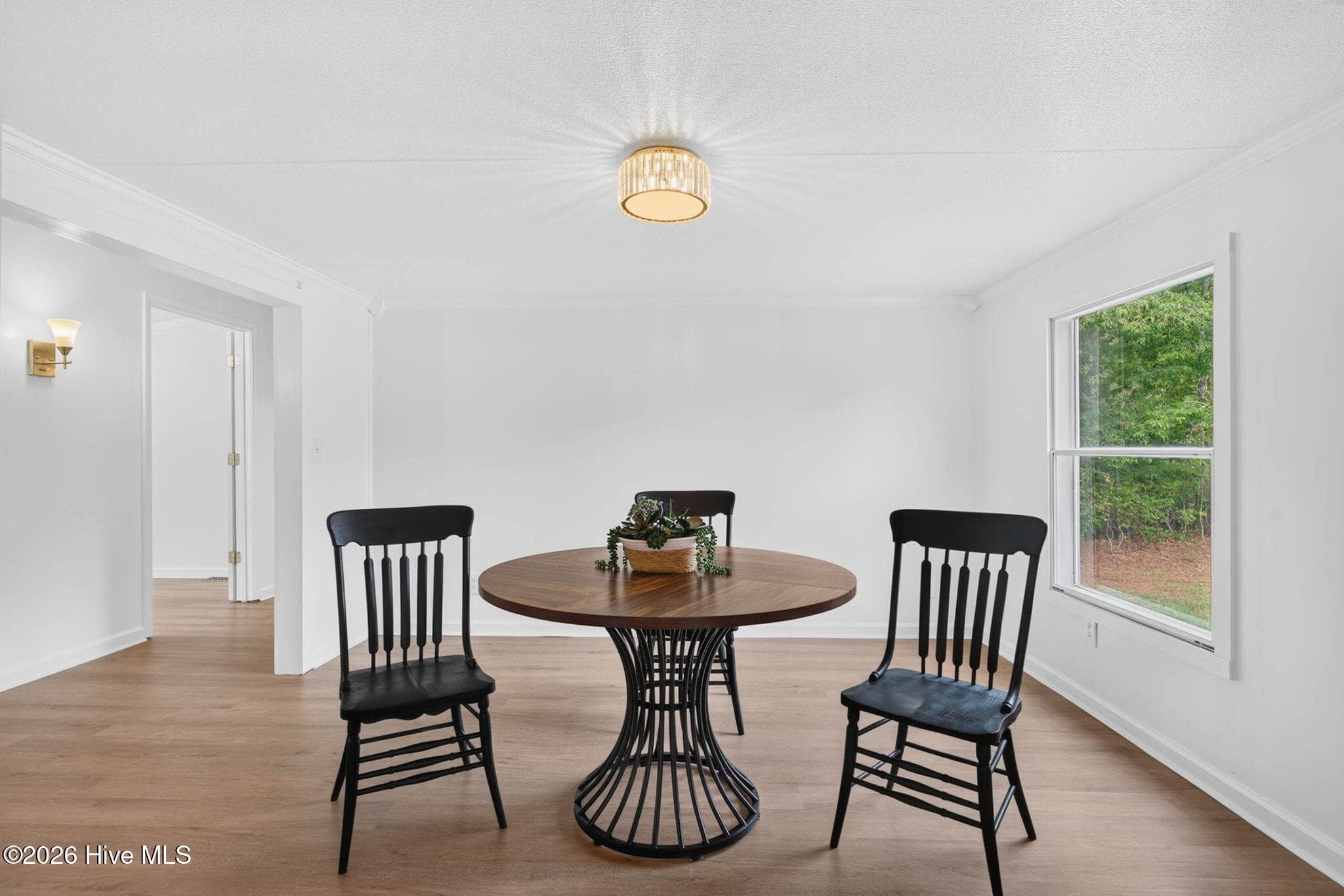 The formal dining room provides an inviting space for family dinners, holiday gatherings, and entertaining guests. - 1199 Zack Street SE, Bolivia, NC 28422