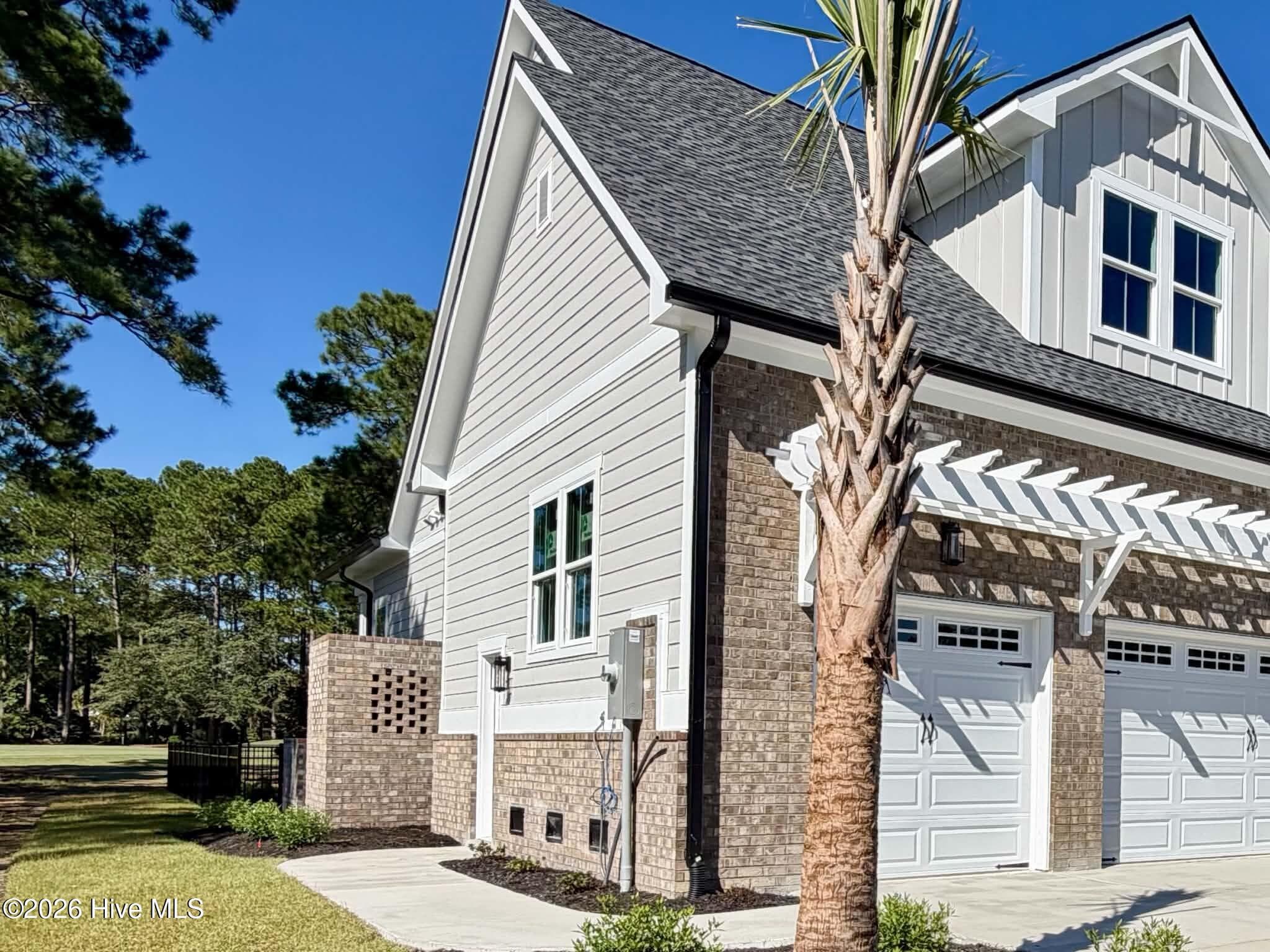 Left side view. - 550 Glenburnie Street NW, Calabash, NC 28467