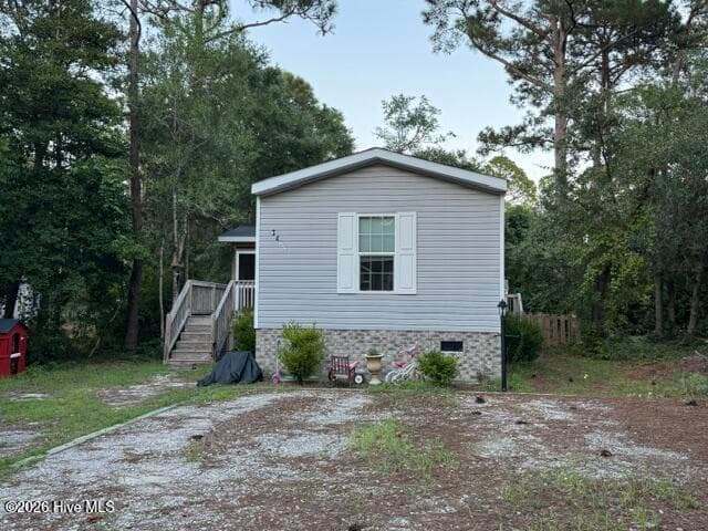 Manufactured Home at 3474 Tarpon Court SE, Bolivia, NC 28422, photo 2 of 24