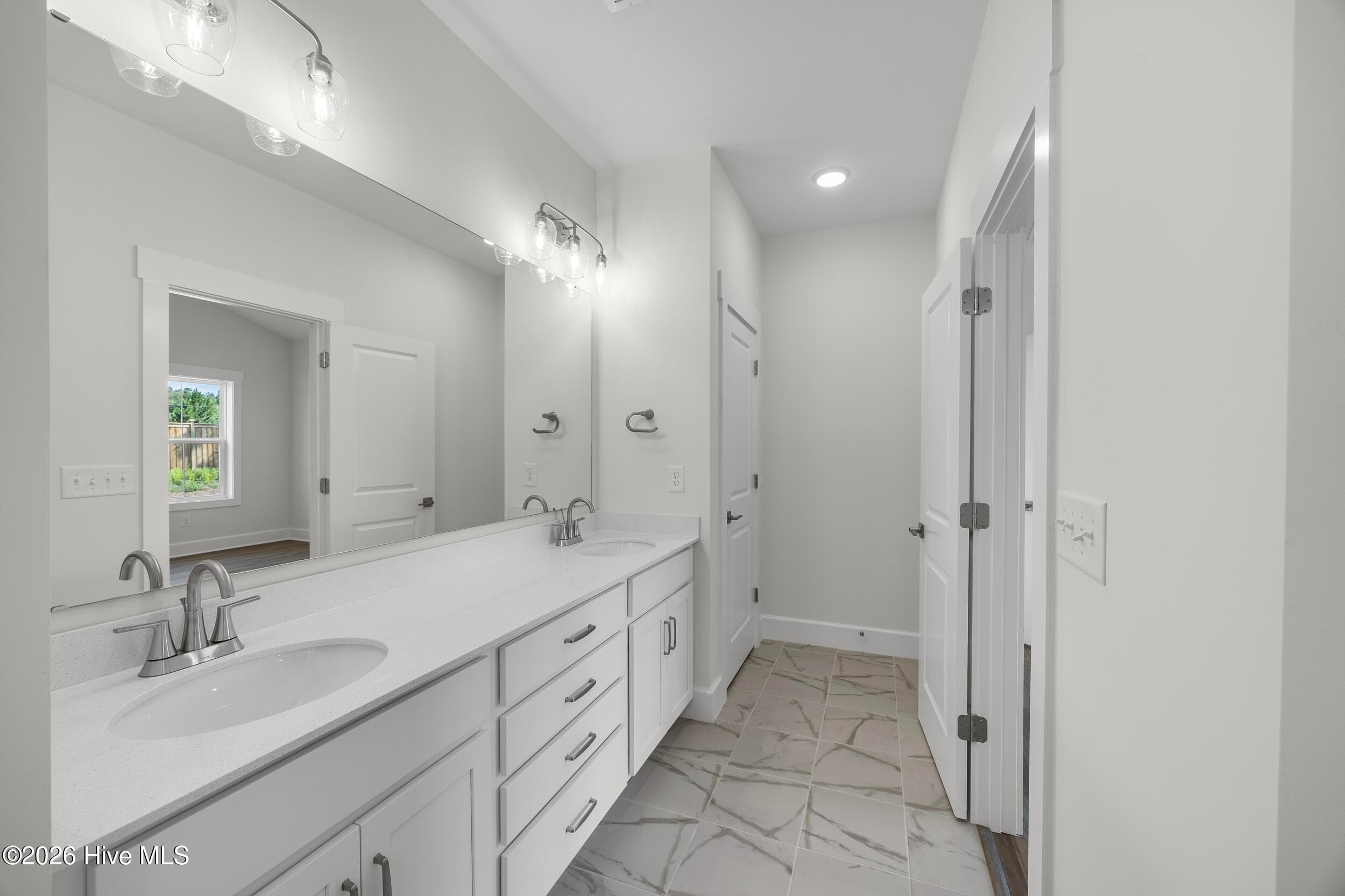 “Home shown is a representation of the floor plan and may include optional features or upgrades. Elevations, materials, colors, finishes, square footage, and included features may vary from the actual home. Please consult a Sales Representative for complete details.” - 7096 Marsh Shore Point 148, Leland, NC 28451