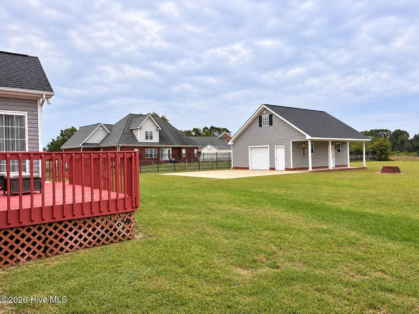 Second garage with storage room, porch, and attic - 105 Pointe Drive, La Grange, NC 28551