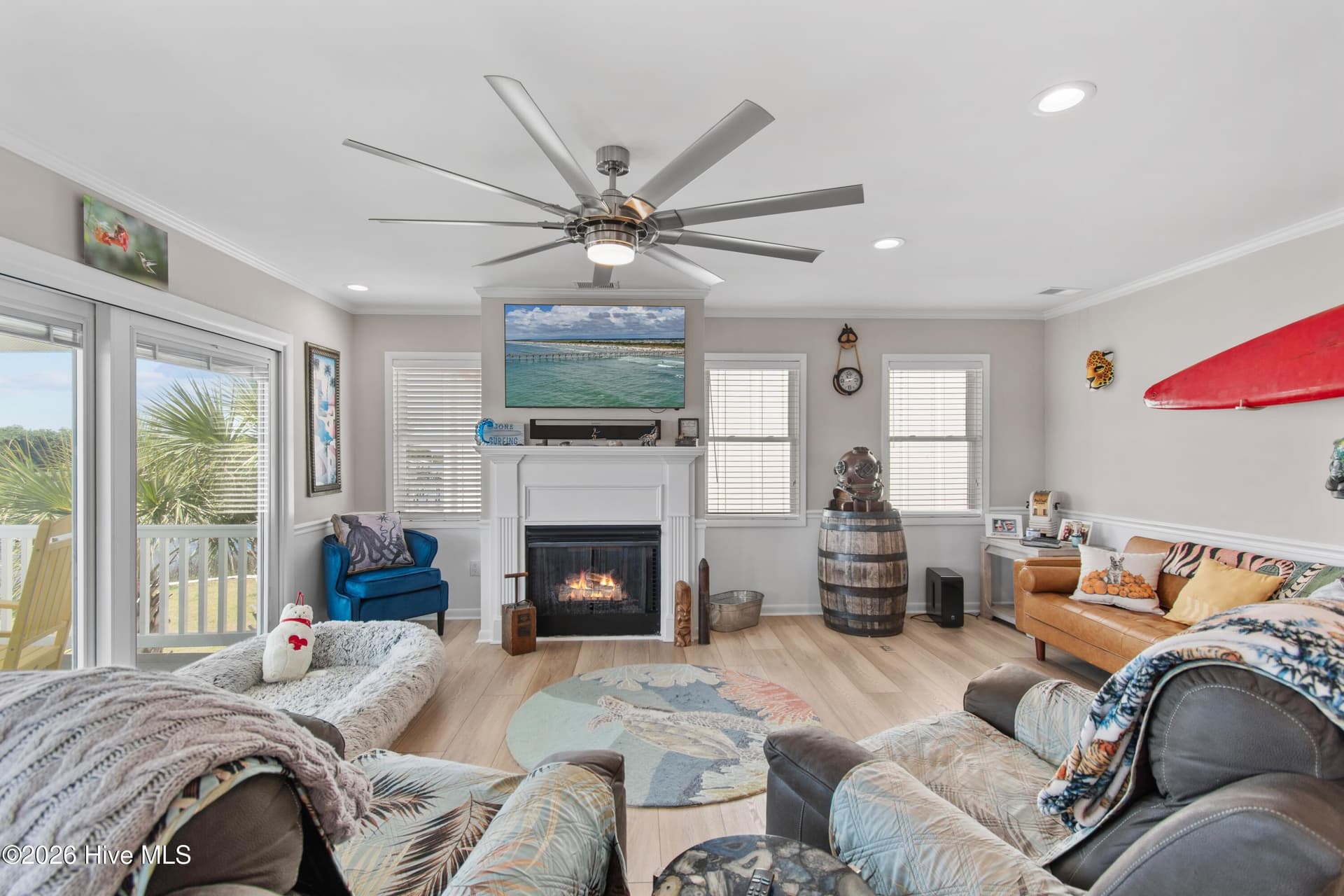 Living room with fireplace, light and airy feel. - 2024 Camelot Drive SW, Ocean Isle Beach, NC 28469