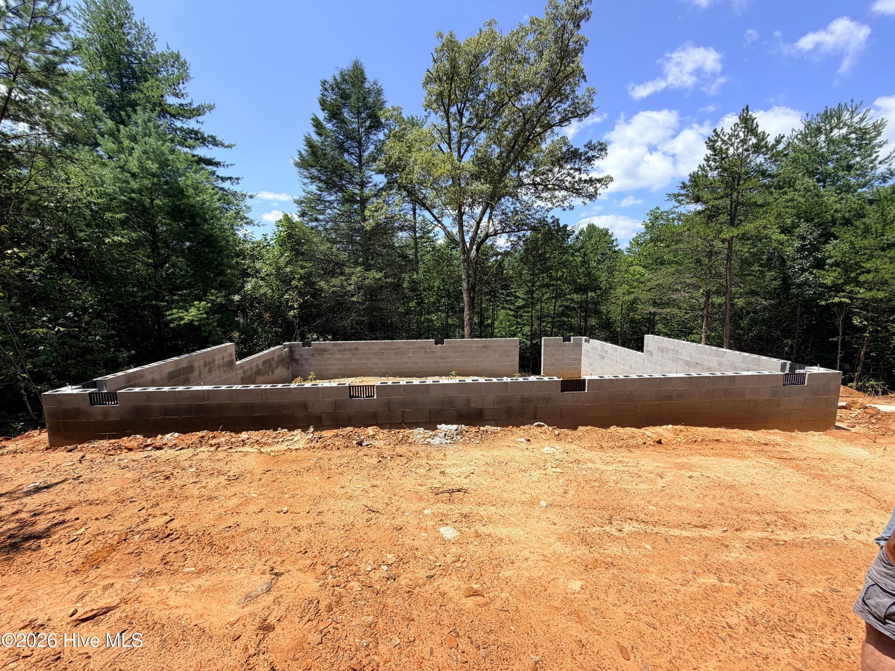 Construction progress as of July 31, 2026. Follow the home's progress as updated photos are added throughout each stage of construction. - 212 Kramers Knob Lane, Murphy, NC 28906