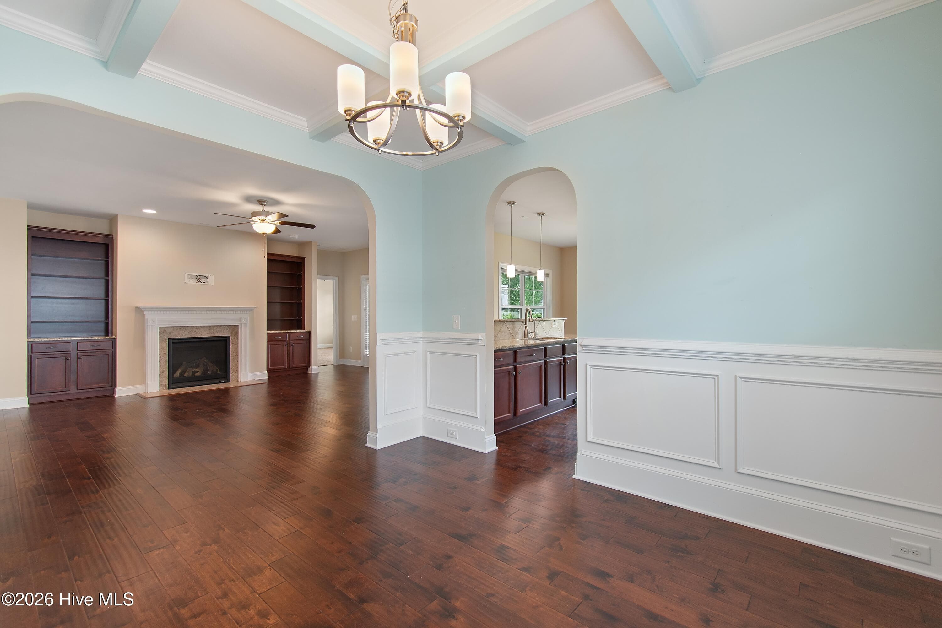 Coffered ceiling in dining room with wainscoting. - 1674 Back Bay Drive SW, Shallotte, NC 28470