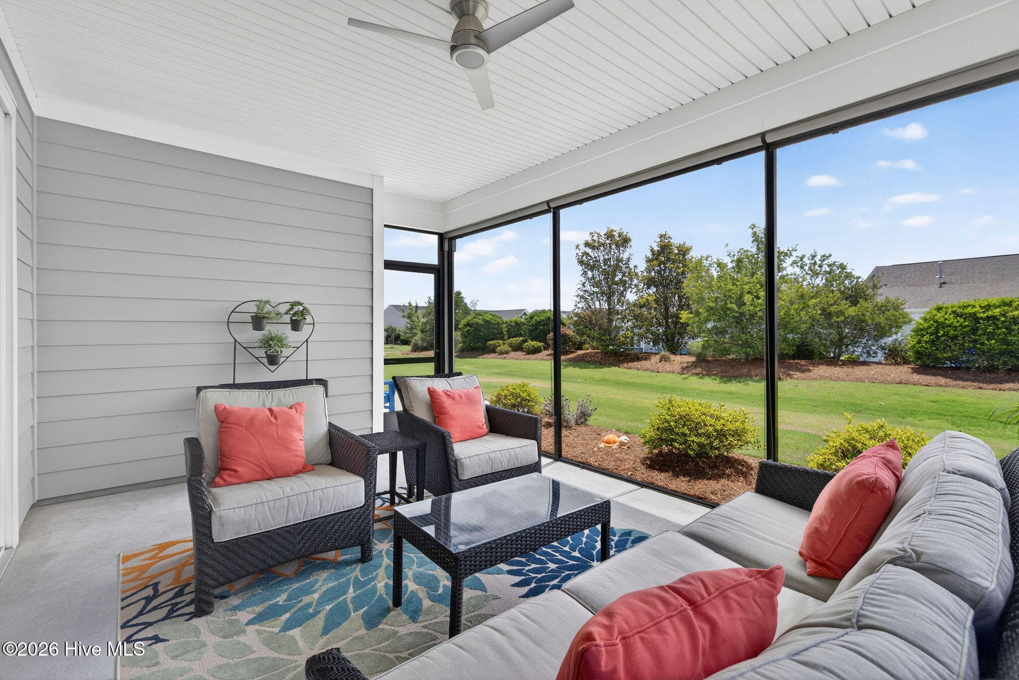 Screened porch with pull down shades - 858 Broomsedge Terrace, Wilmington, NC 28412