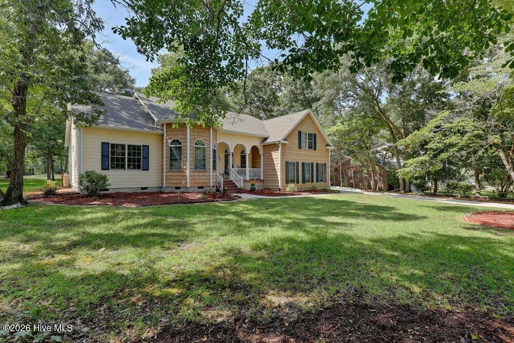 Single Family Residence at 615 Ravenswood Road, Hampstead, NC 28443, photo 2 of 47