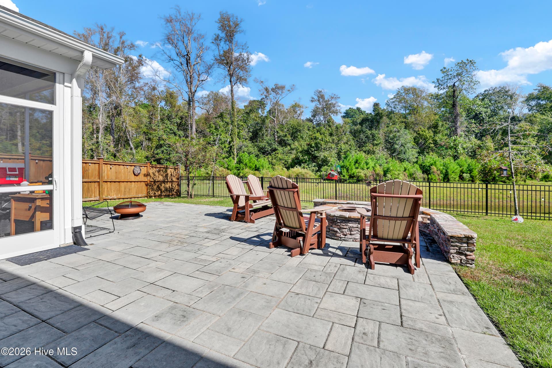 View of Stone Fire Pit & Seating - 512 Edgewater Way, Surf City, NC 28445