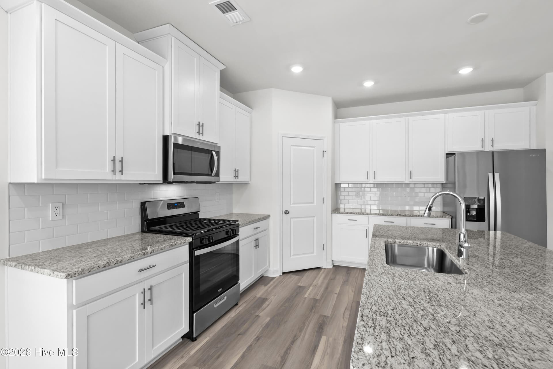 Photo is not of the actual home, but is an example photo of a completed home and may depict options and/or features that are not included - 4154 Generations Circle NW, Ash, NC 28420