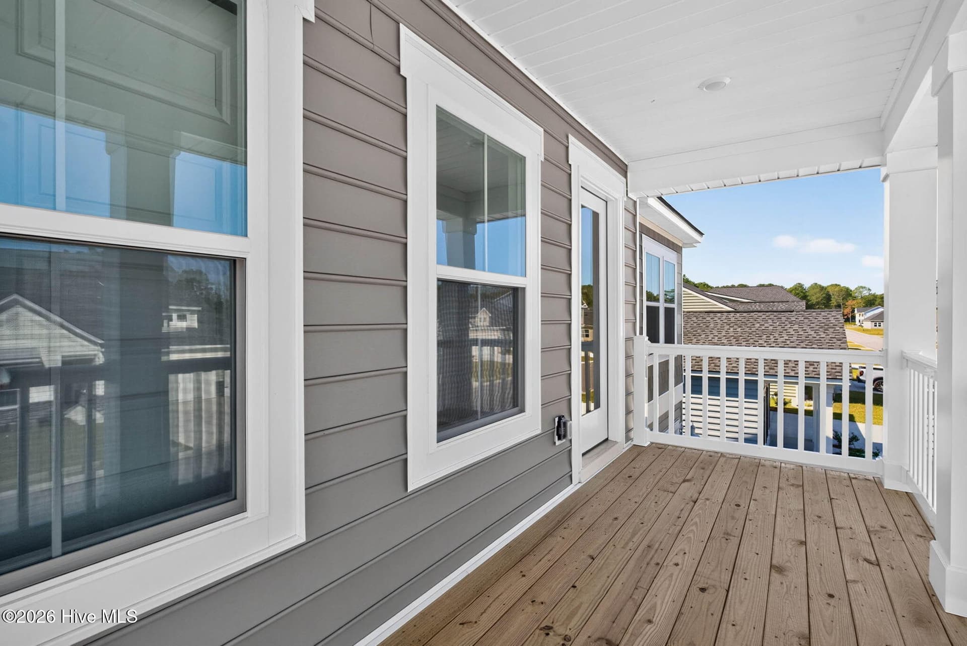 Another view of the upstairs balcony, perfect for enjoying coastal Carolina breezes. - 3447 Sandhill Crane Drive SW, Ocean Isle Beach, NC 28469