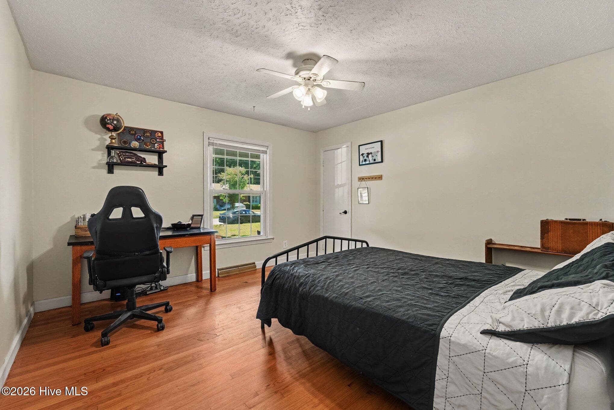 2nd bedroom with ceiling fan and hardwood - 1017 S Claiborne Street, Goldsboro, NC 27530