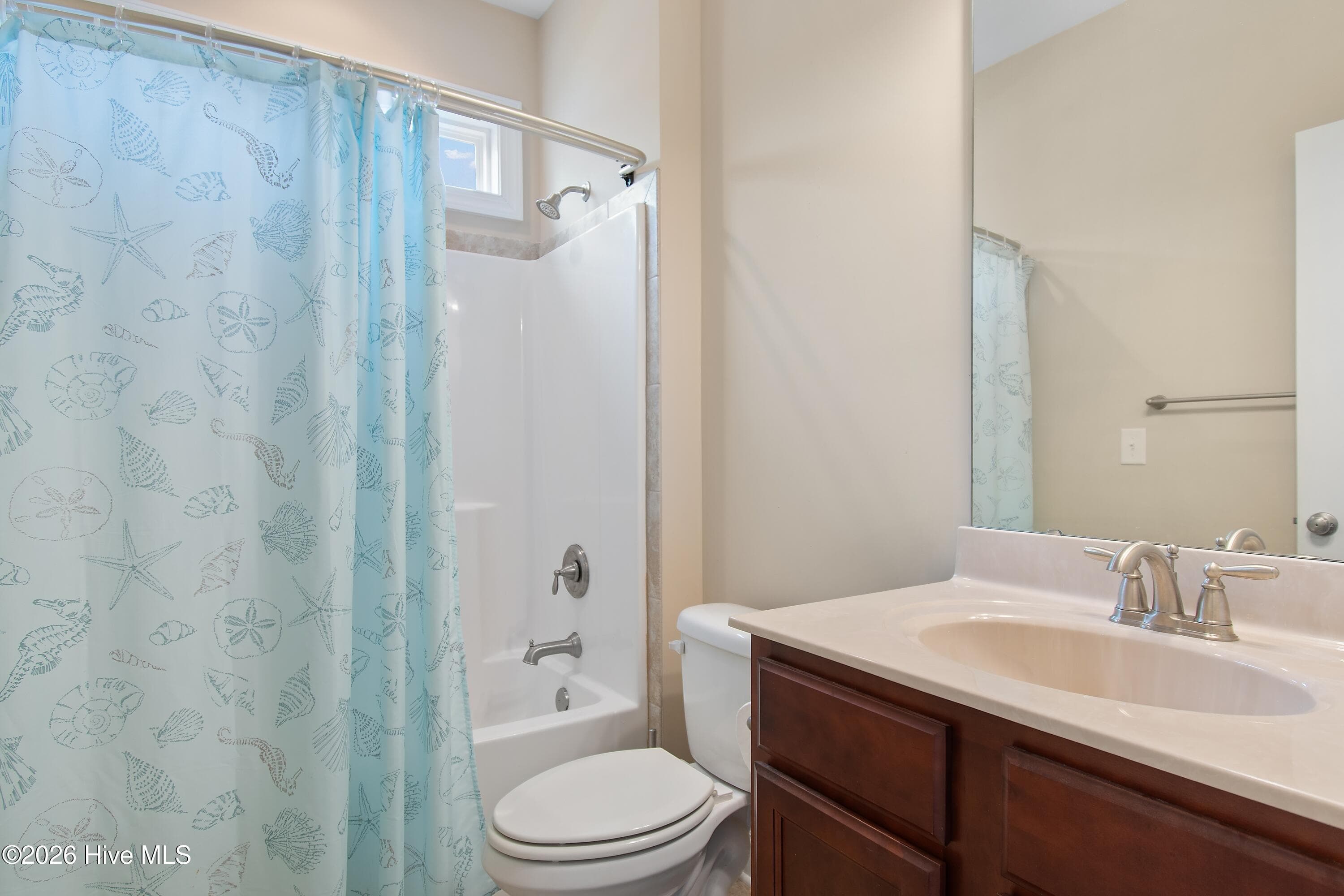 Bathroom #2 on first floor. This is the bathroom for both bedroom #1 and bedroom #2. - 1674 Back Bay Drive SW, Shallotte, NC 28470