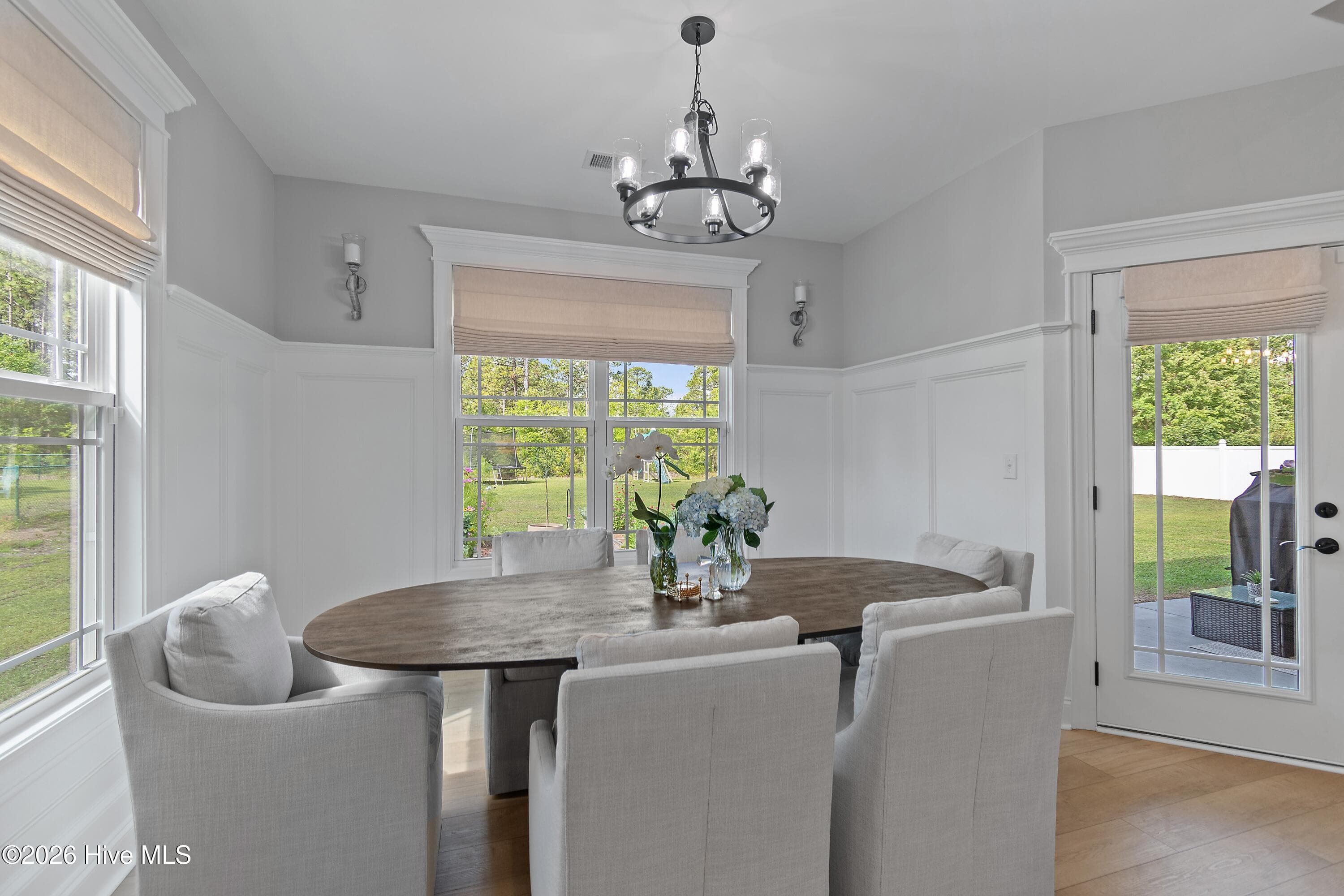 Dining room with access to large back yard. - 299 Boundaryline Drive NW, Calabash, NC 28467