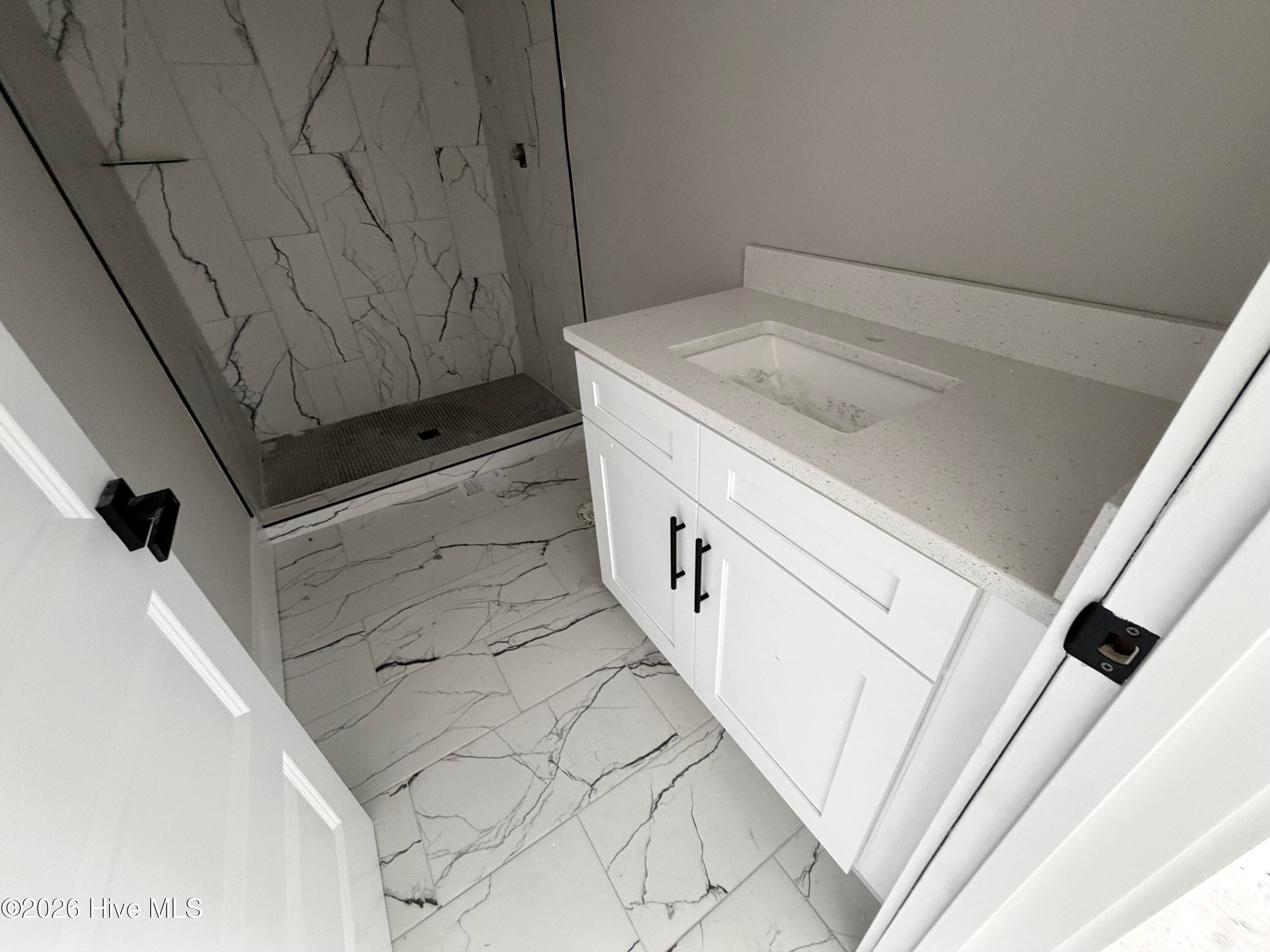 Guest bedroom 3 ensuite bath, under construction. - 550 Glenburnie Street NW, Calabash, NC 28467