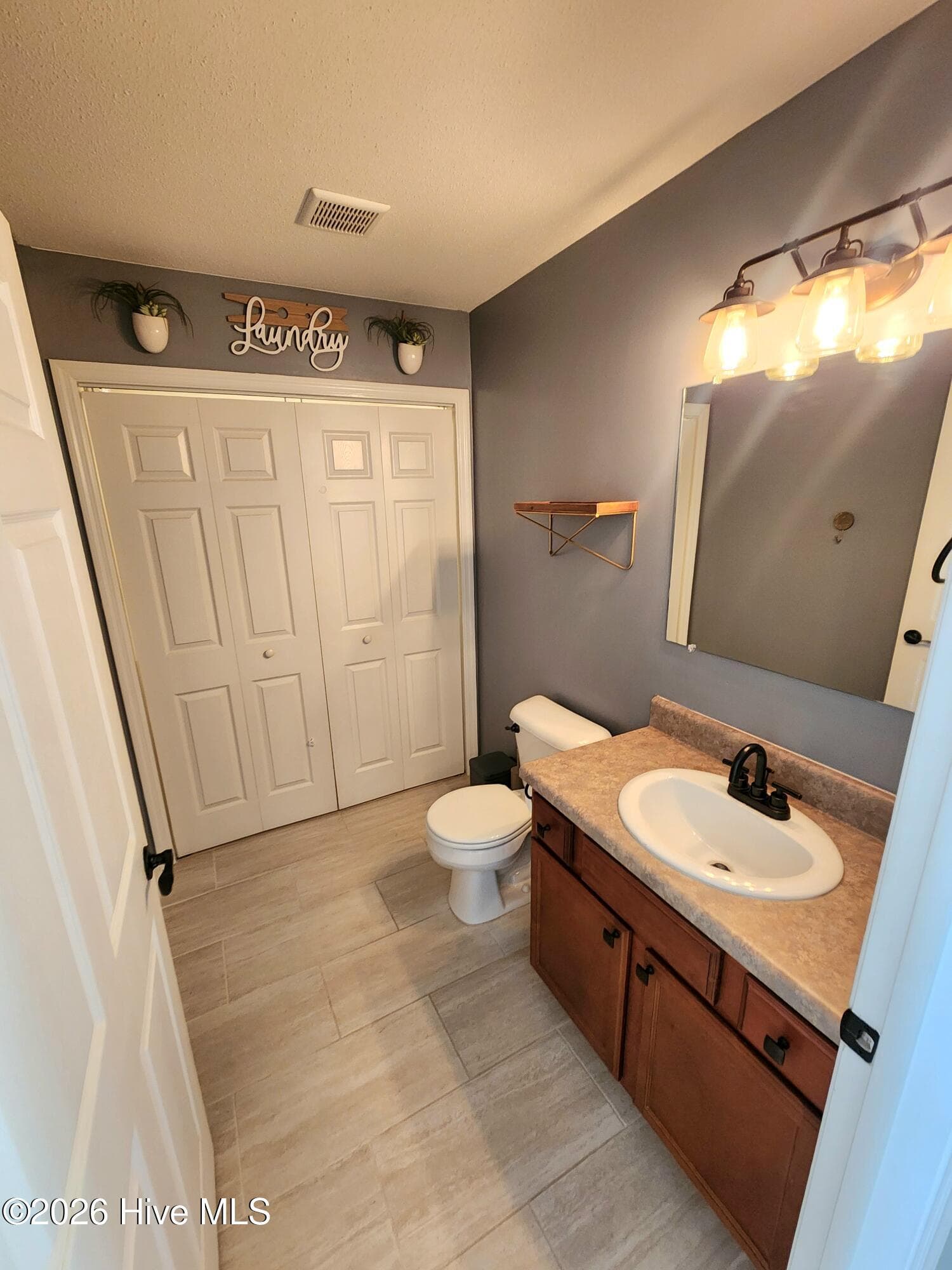 Powder Room & Laundry Room - 182 Kelly Circle, Hubert, NC 28539