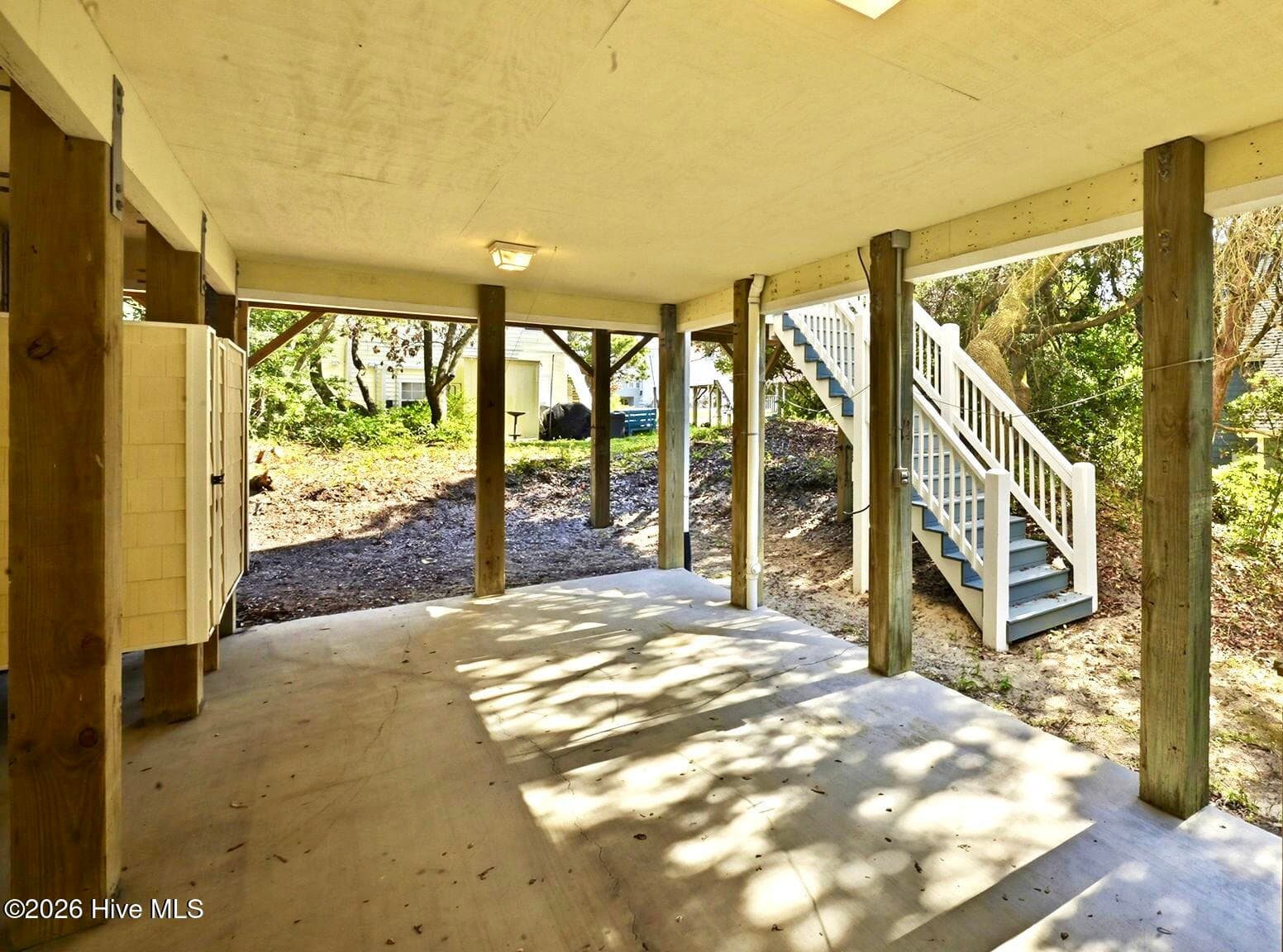 Outside Shower on the left. Steps to Second Floor Deck - 1103 Timber Trail, Emerald Isle, NC 28594