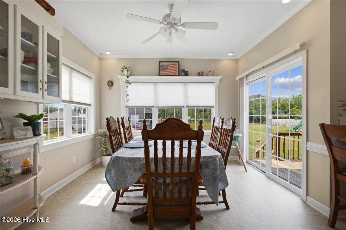Dine-in Kitchen with backyard views - 105 Pointe Drive, La Grange, NC 28551