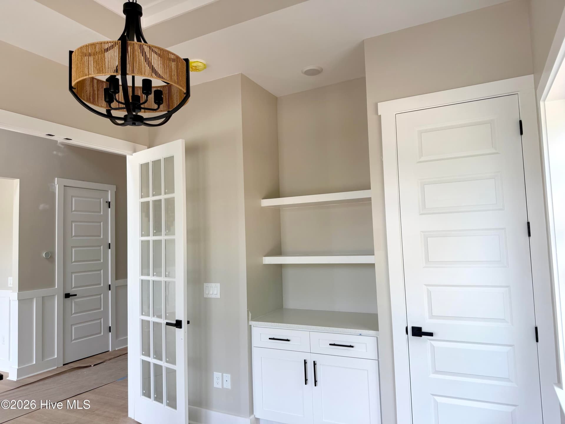 Home office main level custom lighting, trey ceiling and built-ins, Guest bedroom 3 ensuite bath, under construction. - 550 Glenburnie Street NW, Calabash, NC 28467