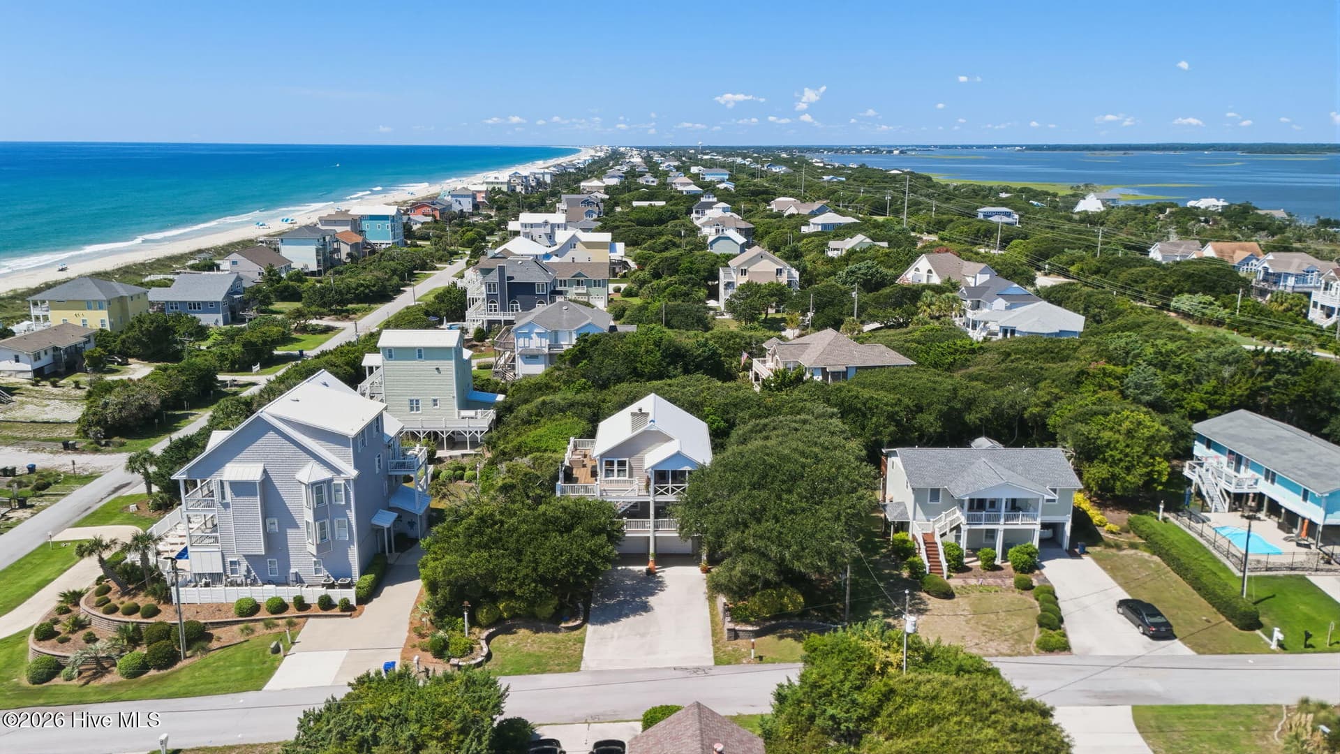 Just three rows from the Atlantic Ocean, this Emerald Isle location offers easy access to the coastal lifestyle. - 103 Georgia Street, Emerald Isle, NC 28594