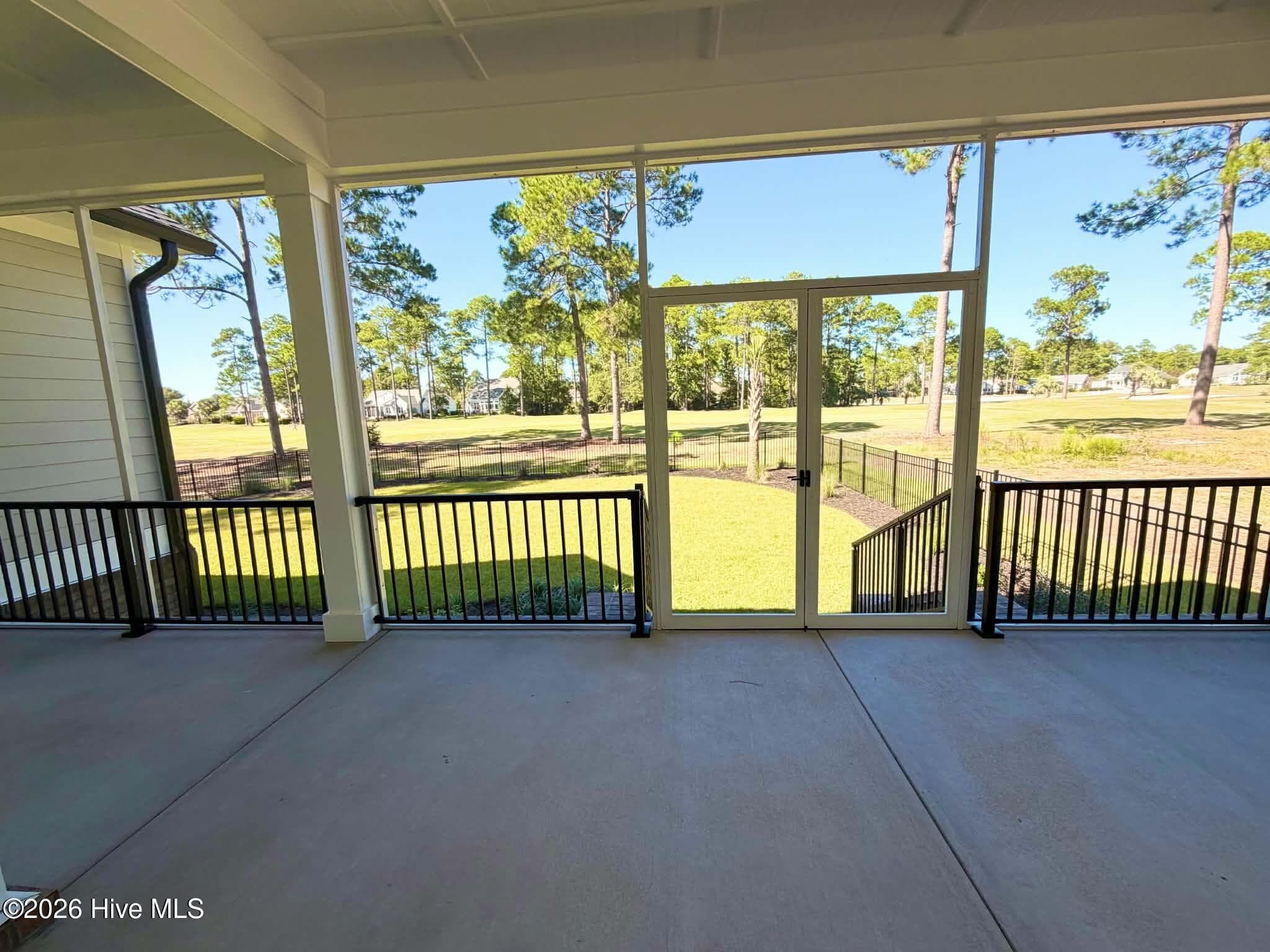 Screen porch view of golf course. - 550 Glenburnie Street NW, Calabash, NC 28467