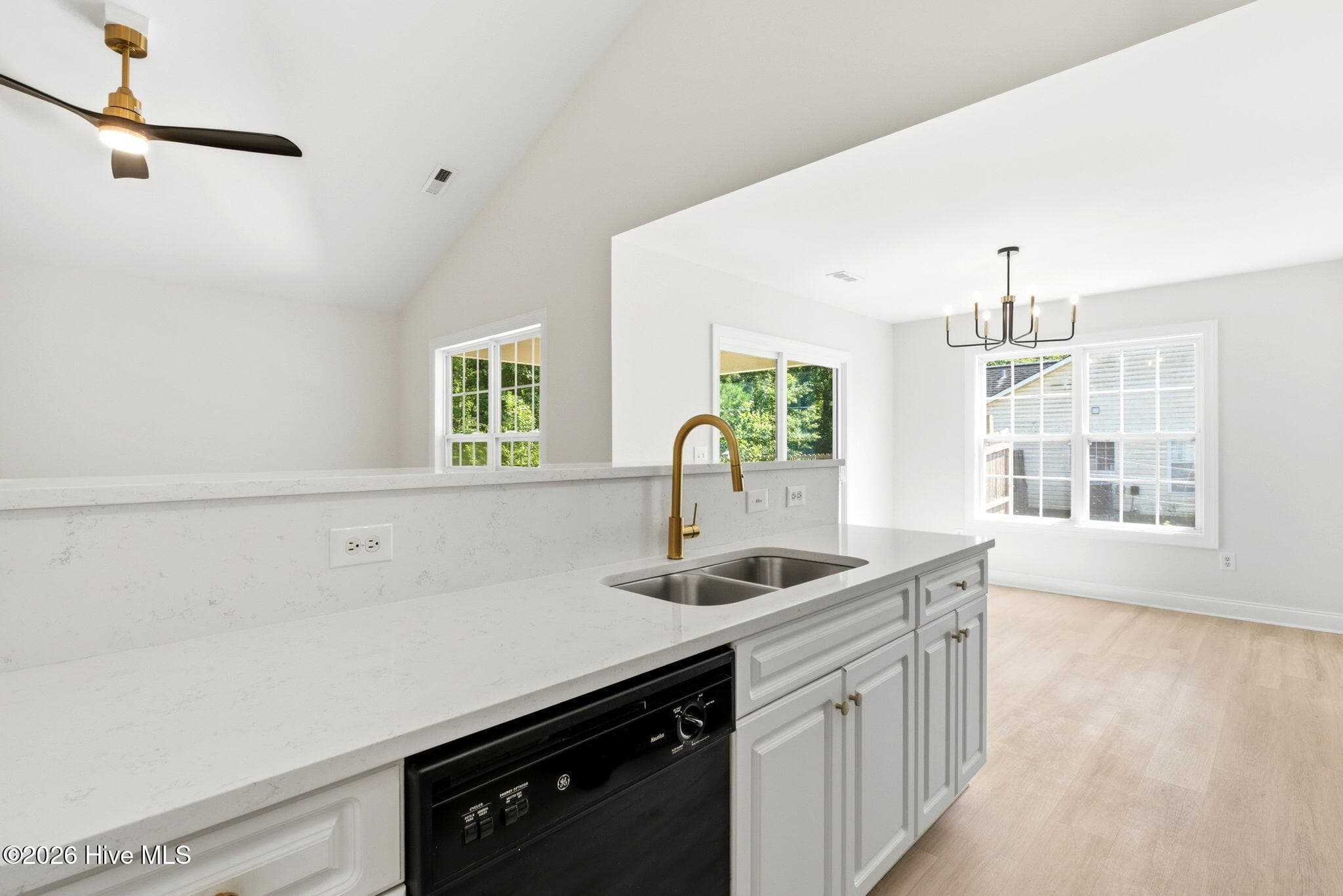 Kitchen looking towards the dining room. - 215 Gardenview Court NE, Leland, NC 28451