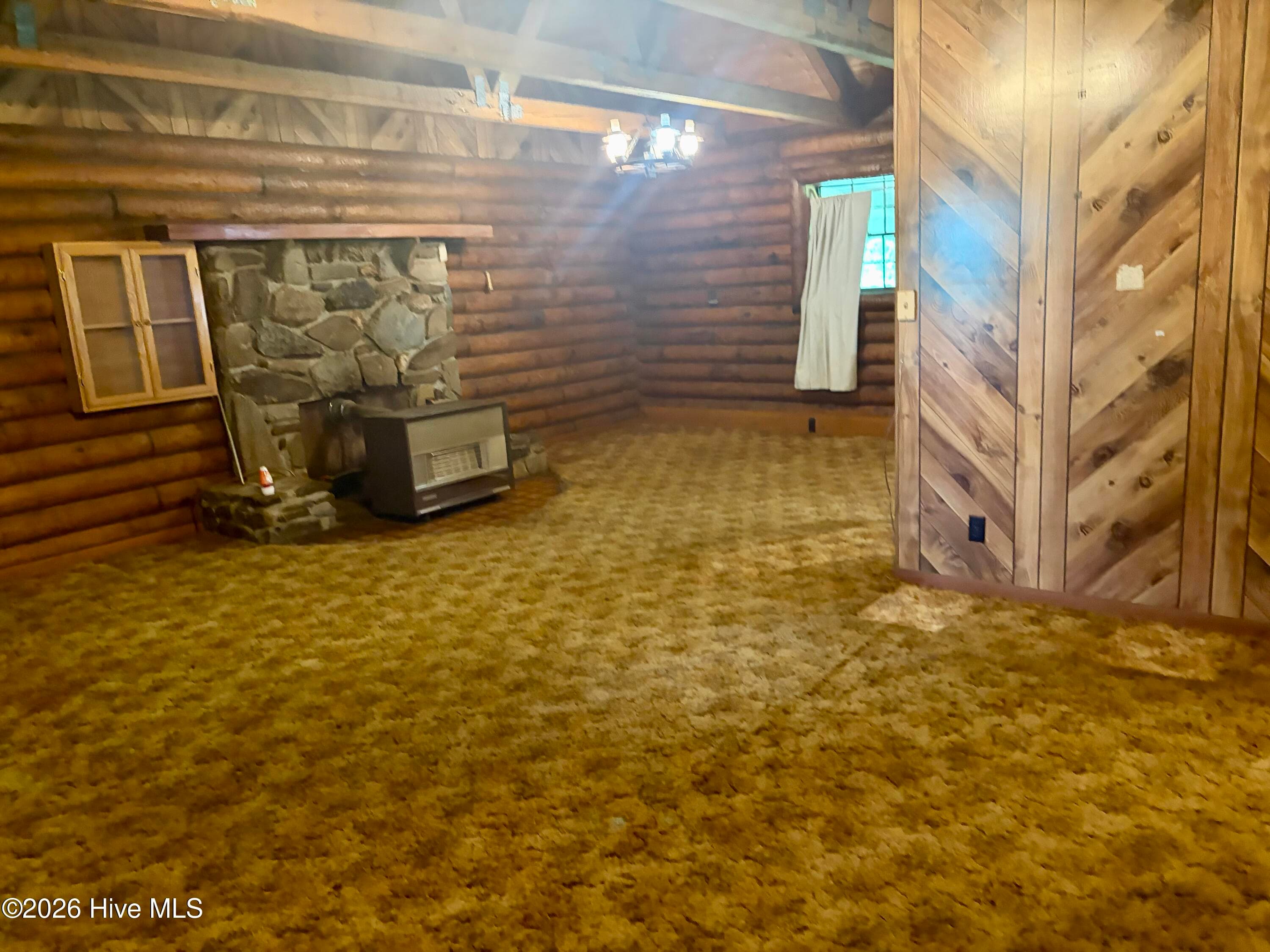 Living Room Fireplace/oil heater - 913 Franks Creek Road, Robbinsville, NC 28771