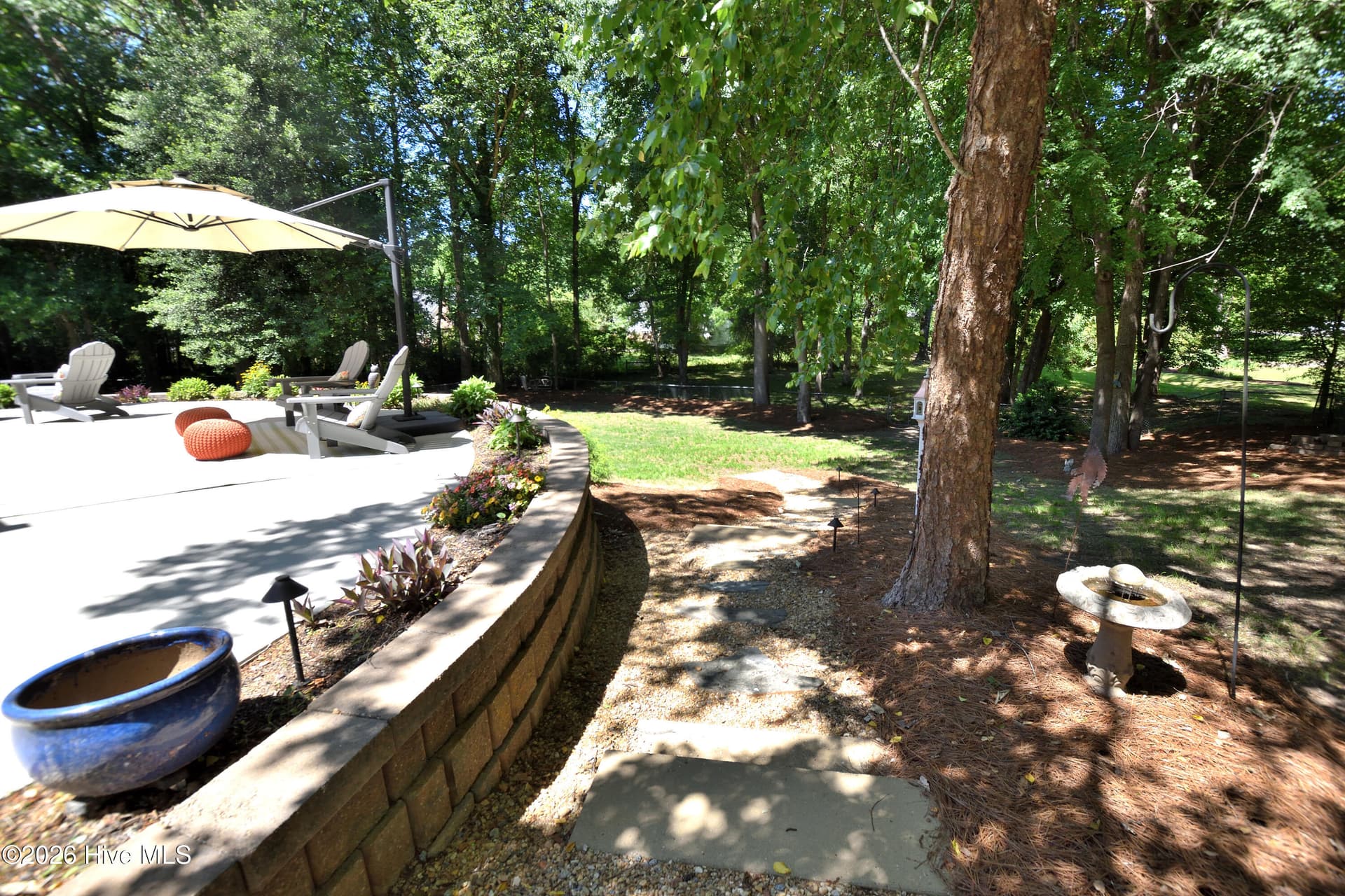 Slate and pebbles inbetween concrete steps - 3924 Crosswinds Drive, Rocky Mount, NC 27803