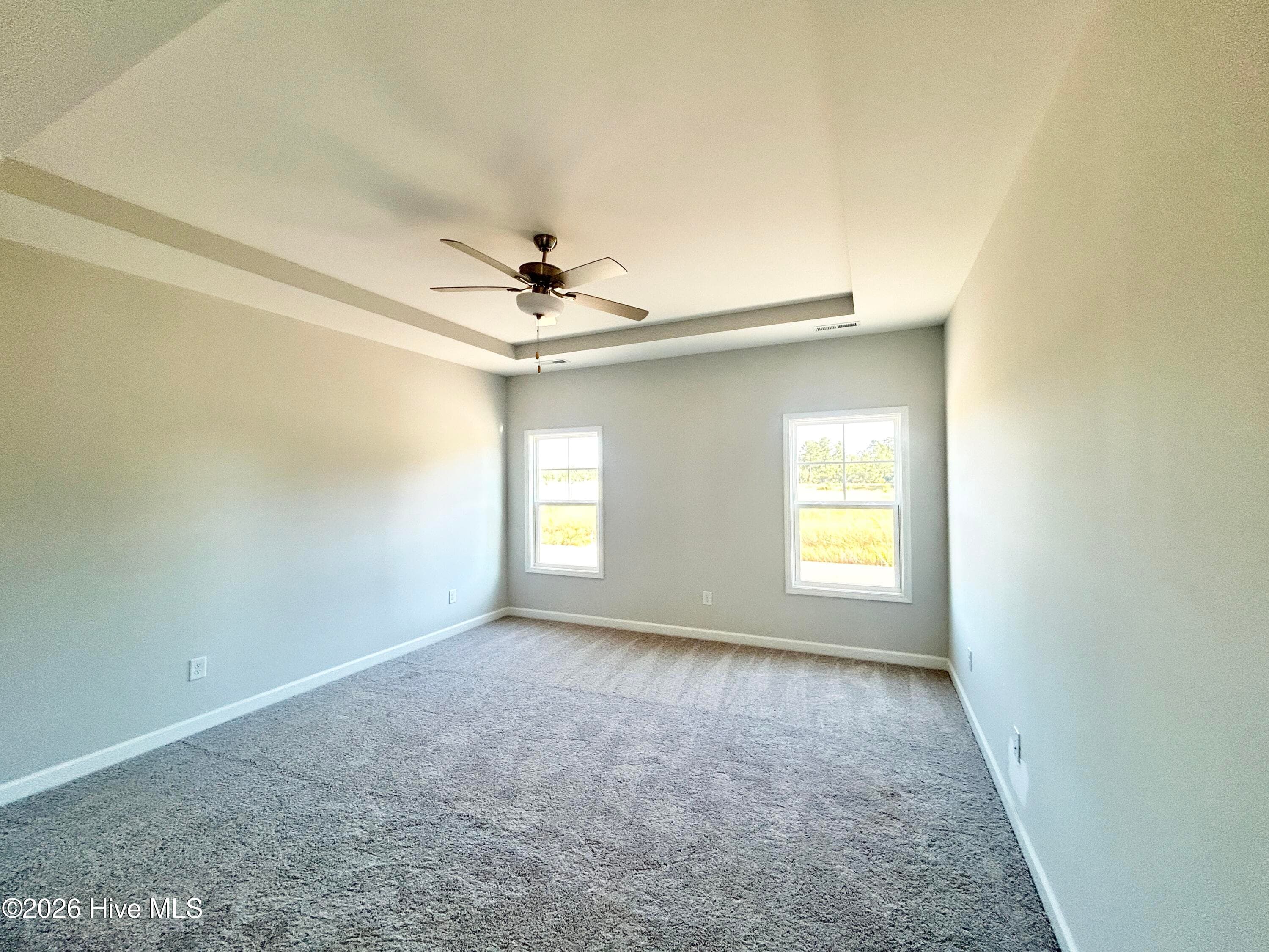 Primary suite features a Private Bathroom with Tile Shower and Large Walk-in Closet - 4208 Workman Loop 94, Leland, NC 28451
