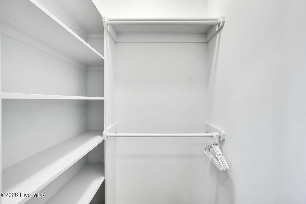 walk in closet guest bedroom - 244 Grandview Drive, Sneads Ferry, NC 28460