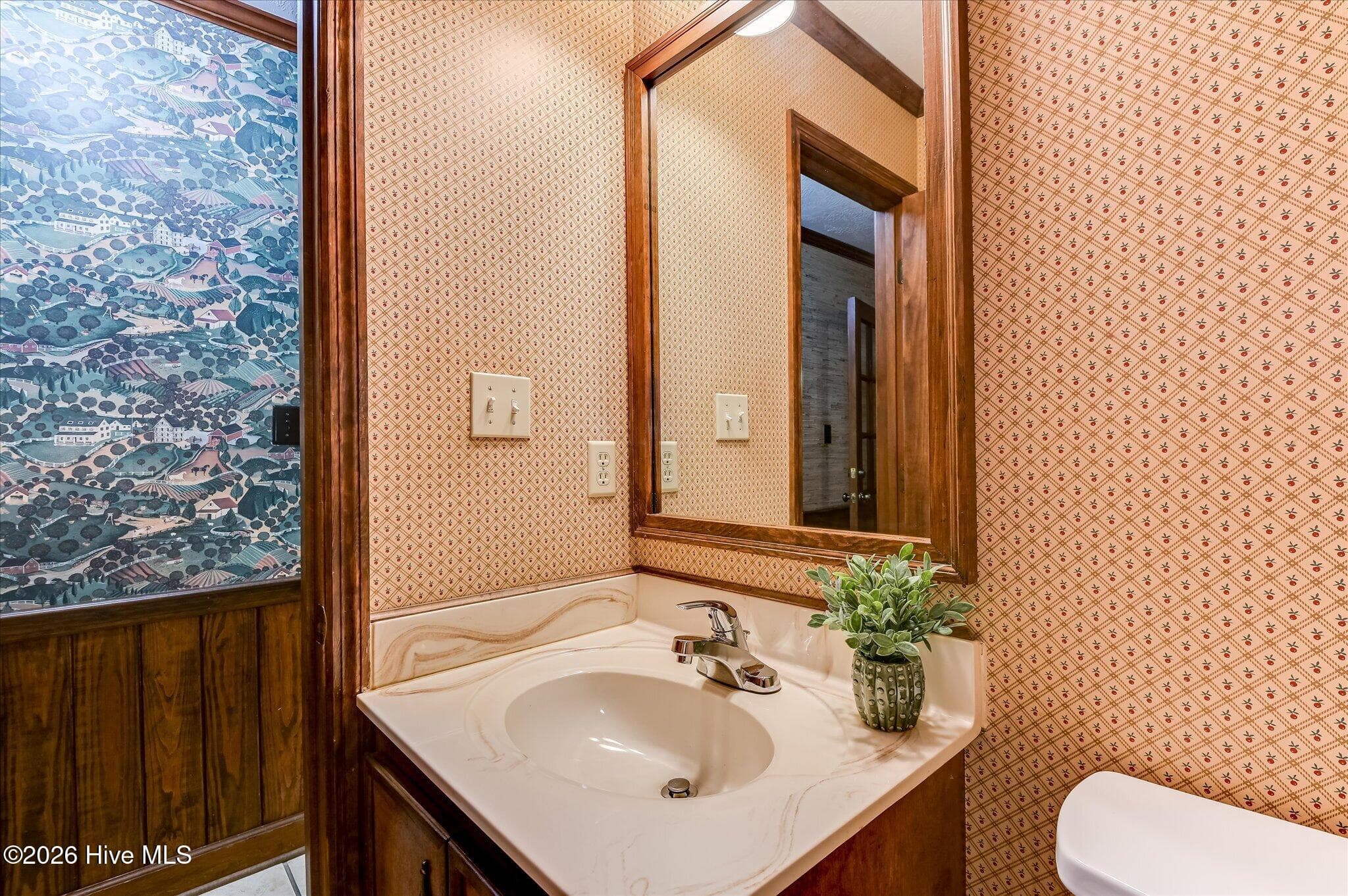 A half bath and large laundry room add convenience downstairs. - 307 Wakefield Lane N, Martinez, GA 30907