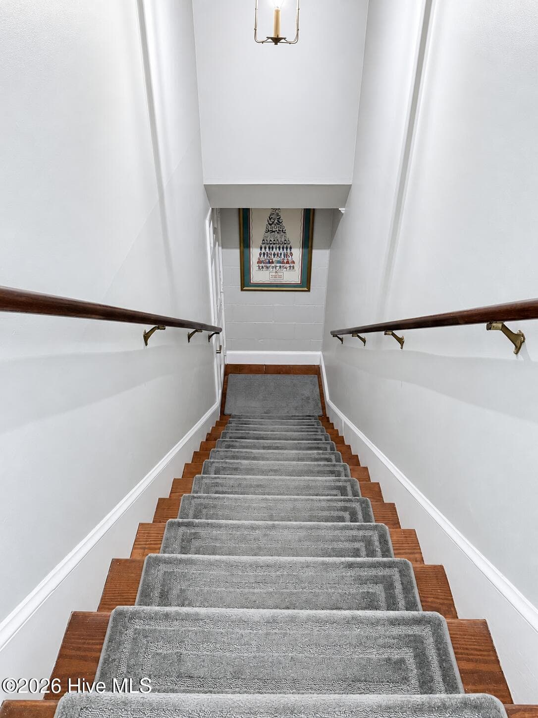 Stairs to lower level - 5405 Cedar Tree Lane, Emerald Isle, NC 28594