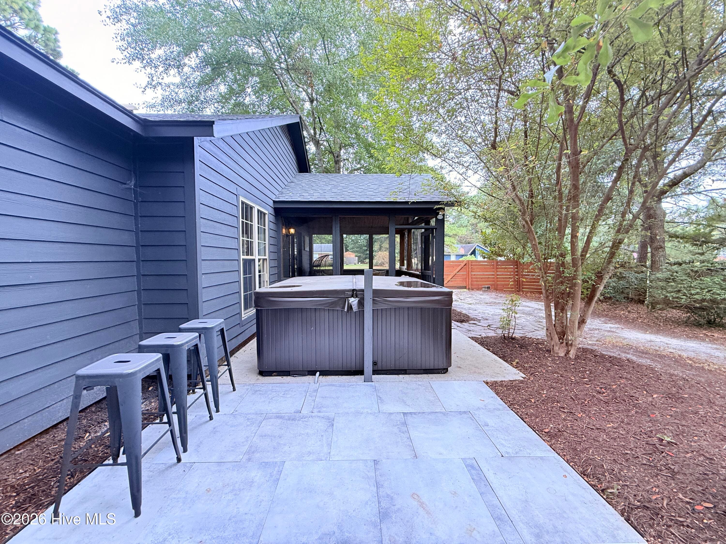 Patio outside Primary suite - 1001 Hunting Ridge Road, Wilmington, NC 28412