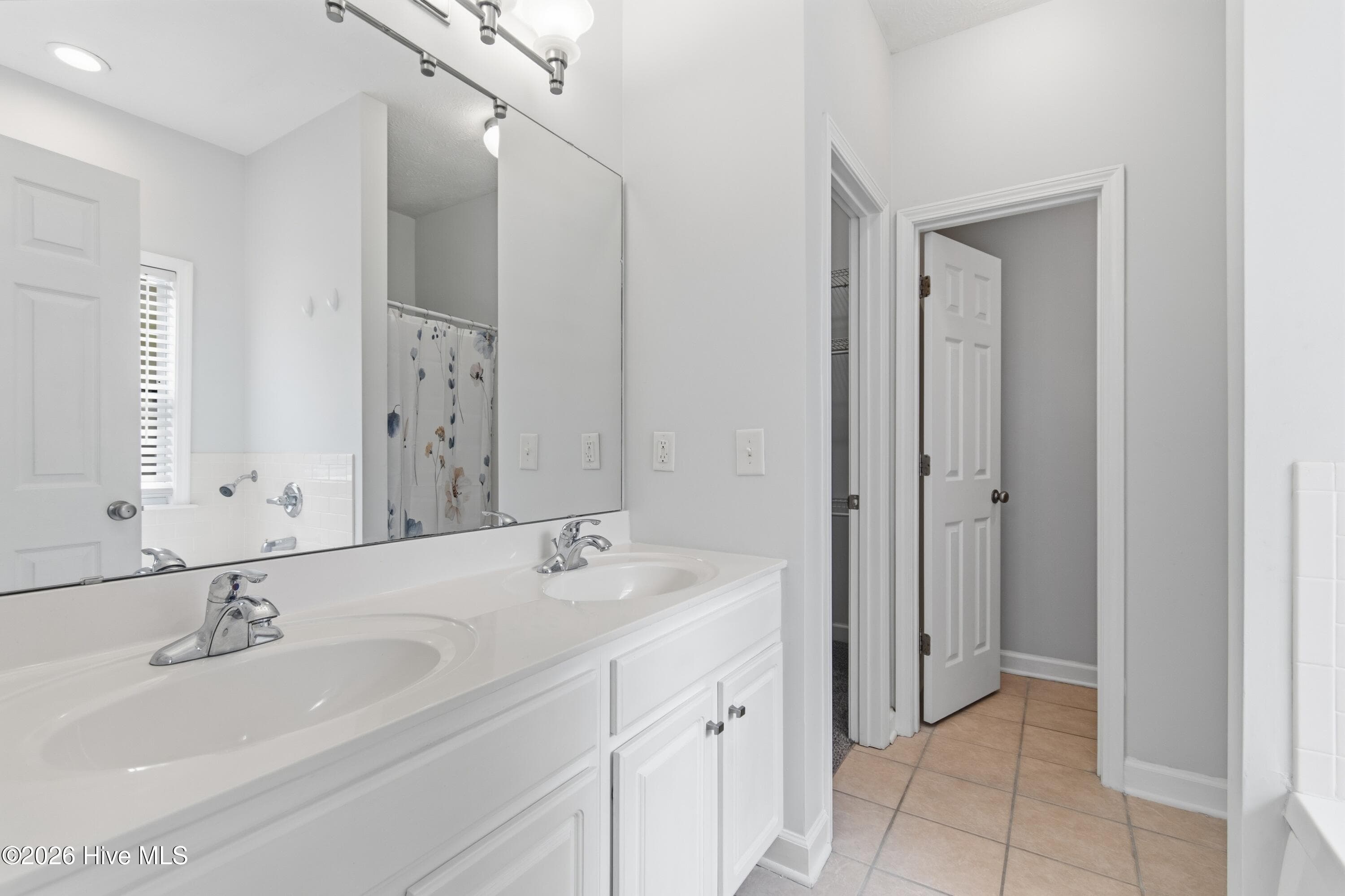 En suite bathroom with water closet. - 709 E Pipers Glen, Shallotte, NC 28470