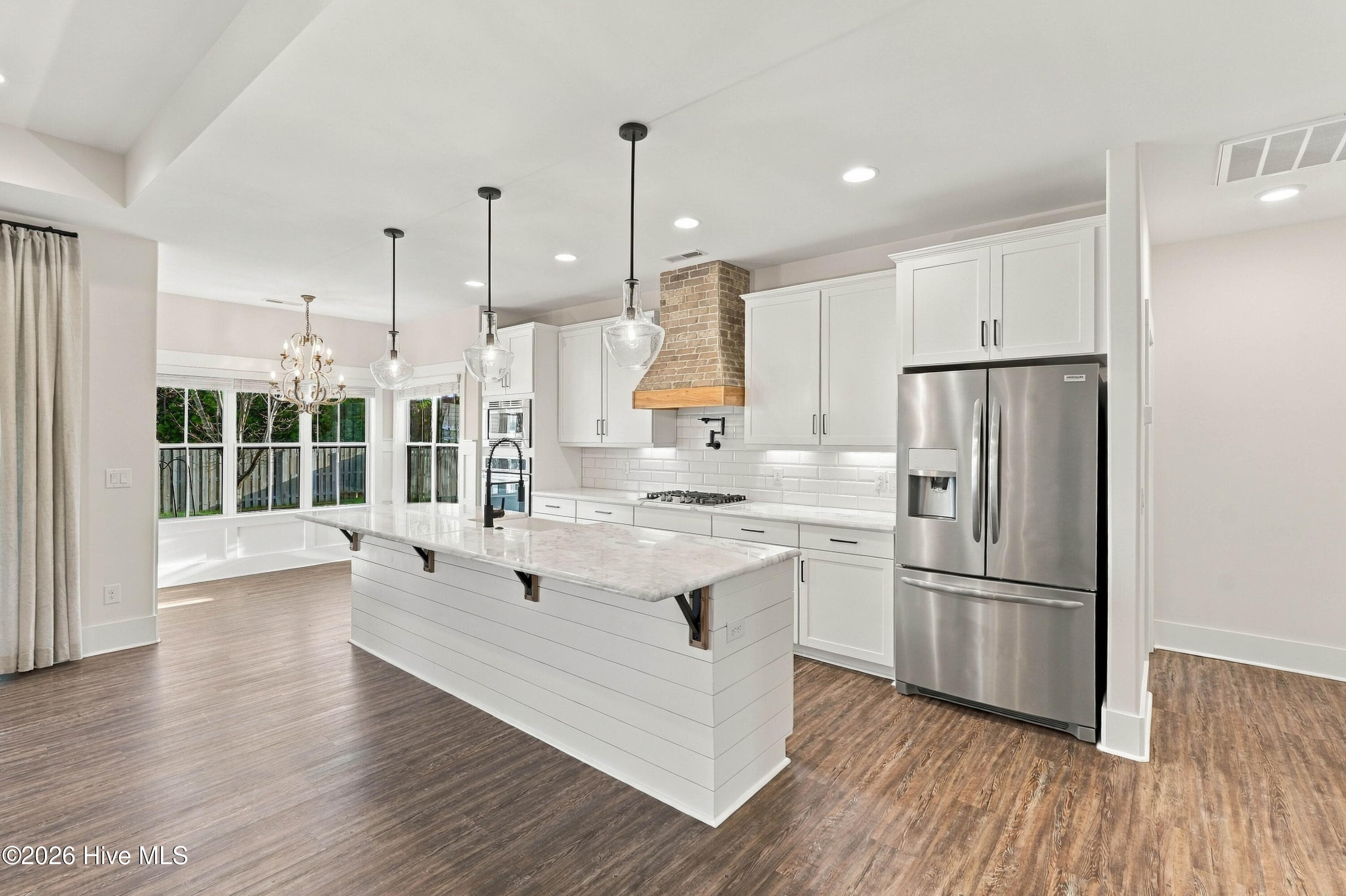 Kitchen and Breakfast Nook - 11 Lemongrass Court, Hampstead, NC 28443