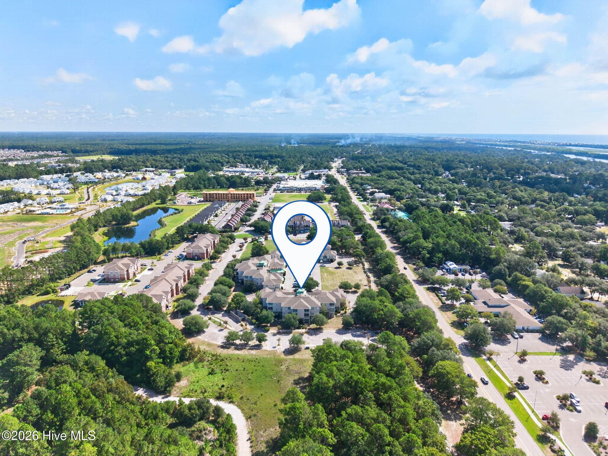 Within walking distance of grocery stores, restaurants, and many shops - 7825 High Market Street #303, Sunset Beach, NC 28468