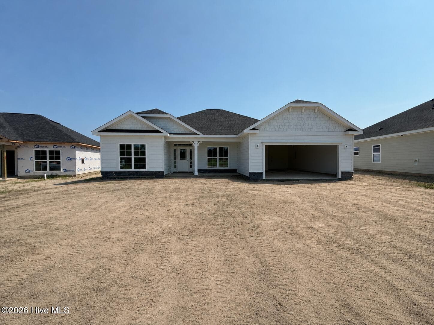 Actual homesite under construction. Picture taken 8/15 - 2129 Sandbrook Loop, Leland, NC 28451