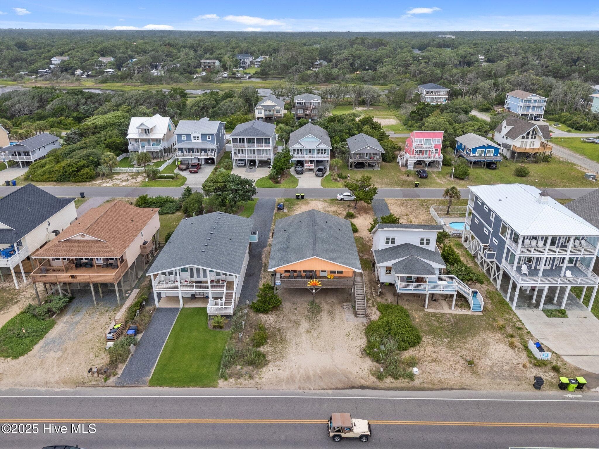 Single Family Residence at 210 W Beach Drive, Oak Island, NC 28465, photo 10 of 42