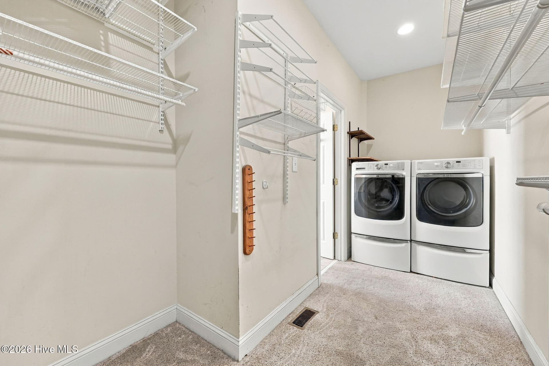 large master closet with laundry - 105 Magens Court W, Cedar Point, NC 28584