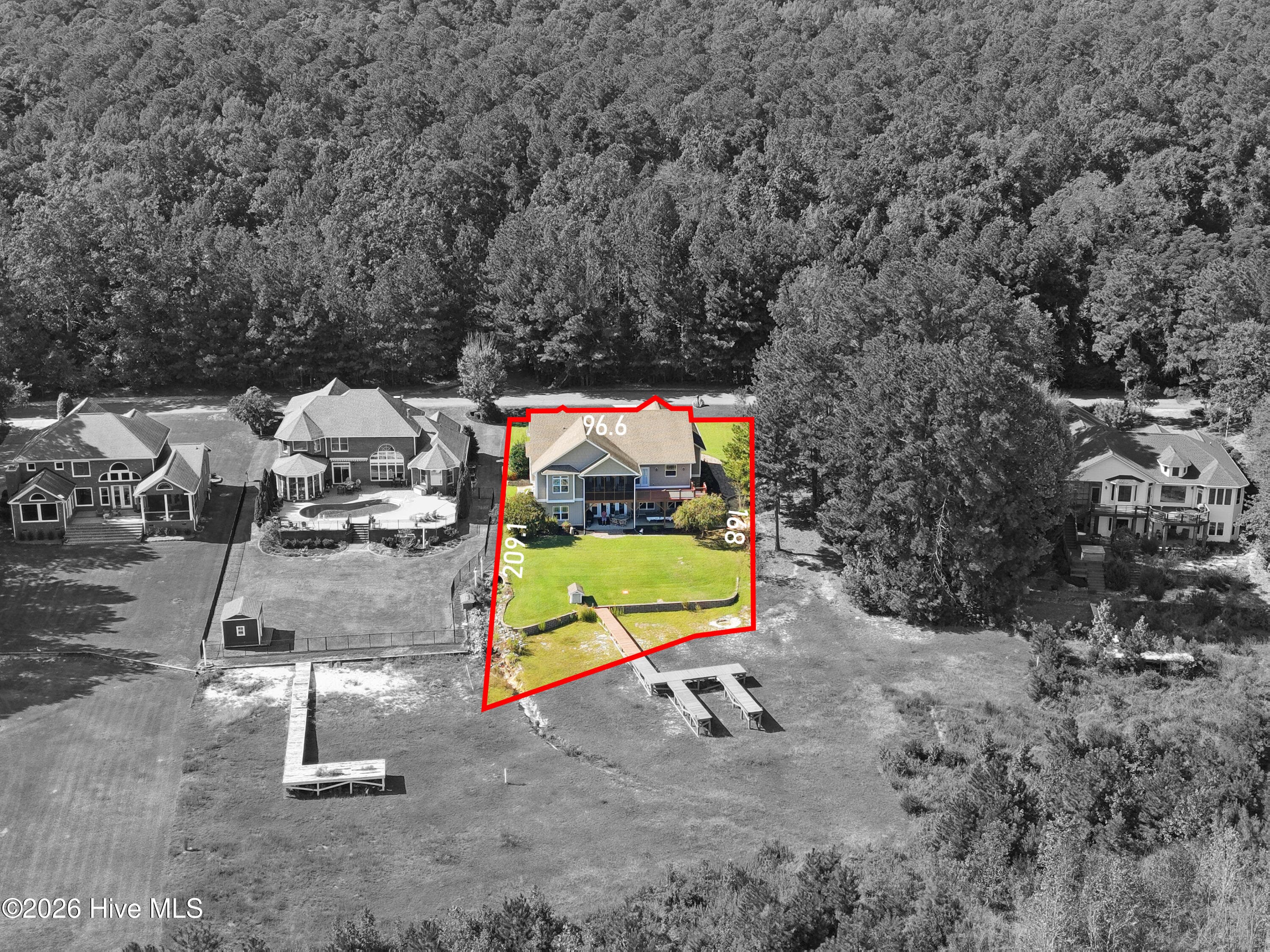 Same street-side aerial of 899 Seagull Drive, surroundings digitally grayed. Lot lines approximate, for illustration only, and digitally added and does not constitute a survey. Buyers are encouraged to verify property boundaries through recorded documents and a current survey as part of their due diligence. - 899 Seagull Drive, Vass, NC 28394, Vass