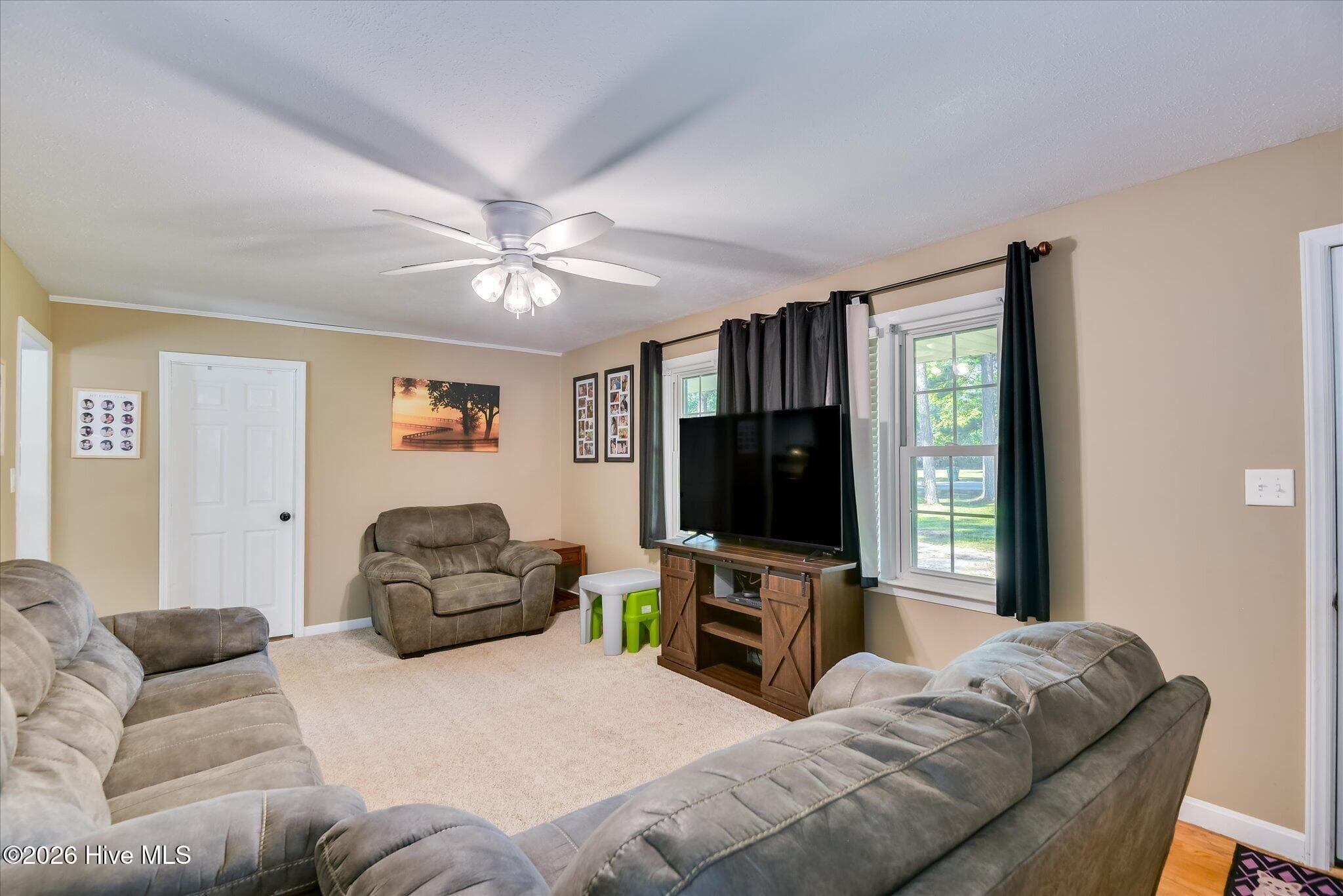 Area rug in photo can be removed to reveal original hardwood floors throughout the home! - 1445 Pine Log Road, Aiken, SC 29803