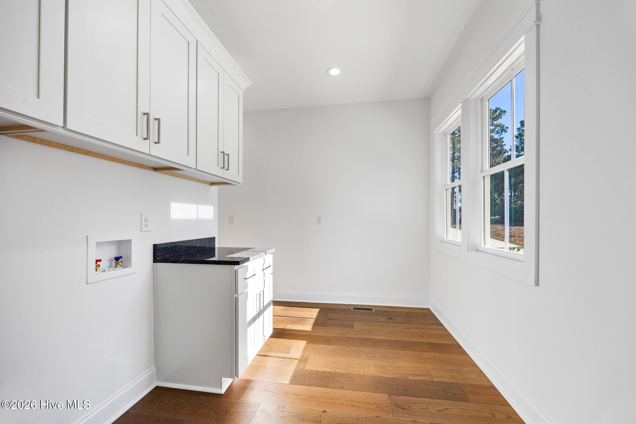 Laundry Room accessible from Master Closet and Mudroom - 26 Kilbride Drive, Pinehurst, NC 28374