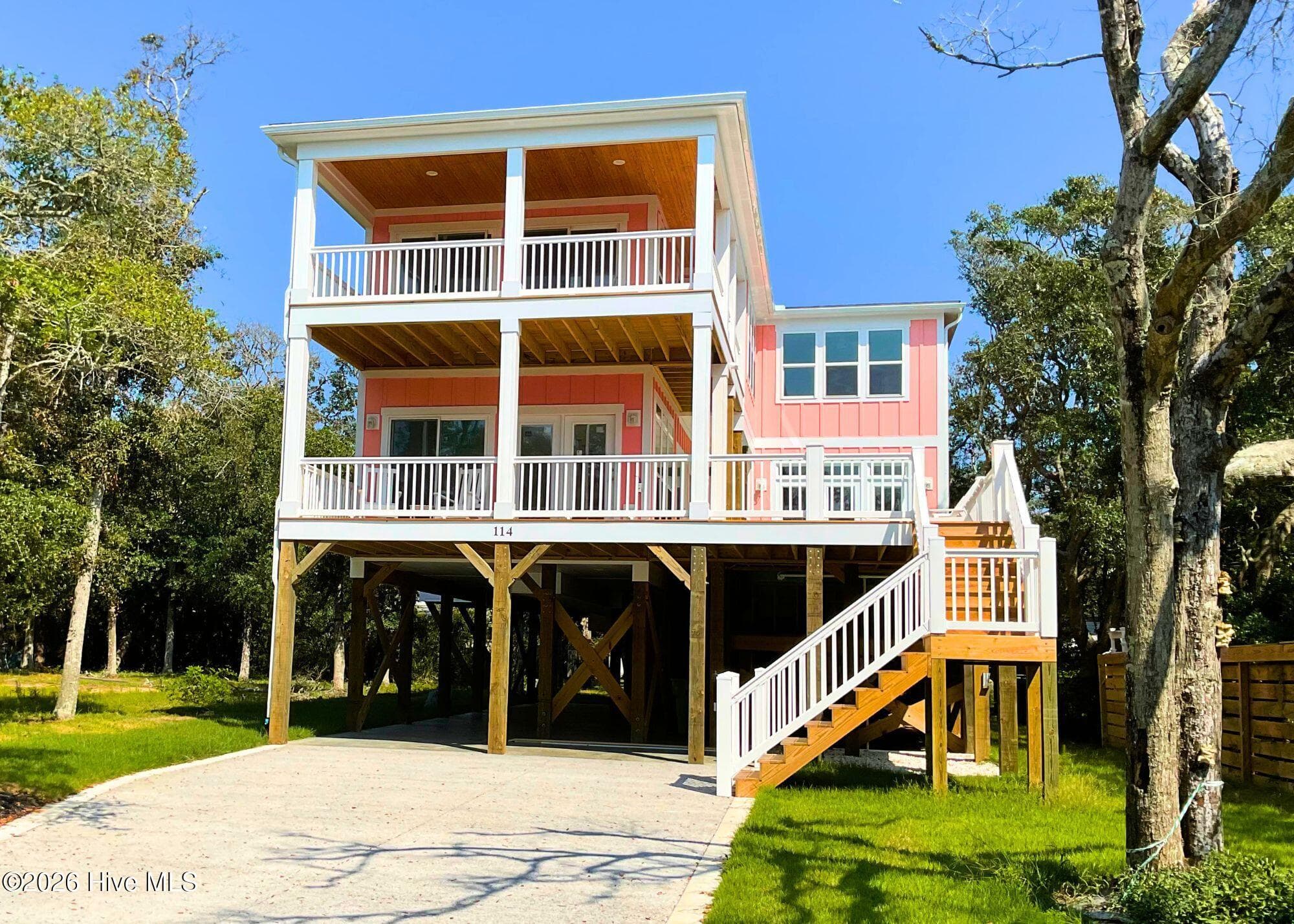 Single Family Residence at 114 SE 75th Street, Oak Island, NC 28465, photo 139 of 164
