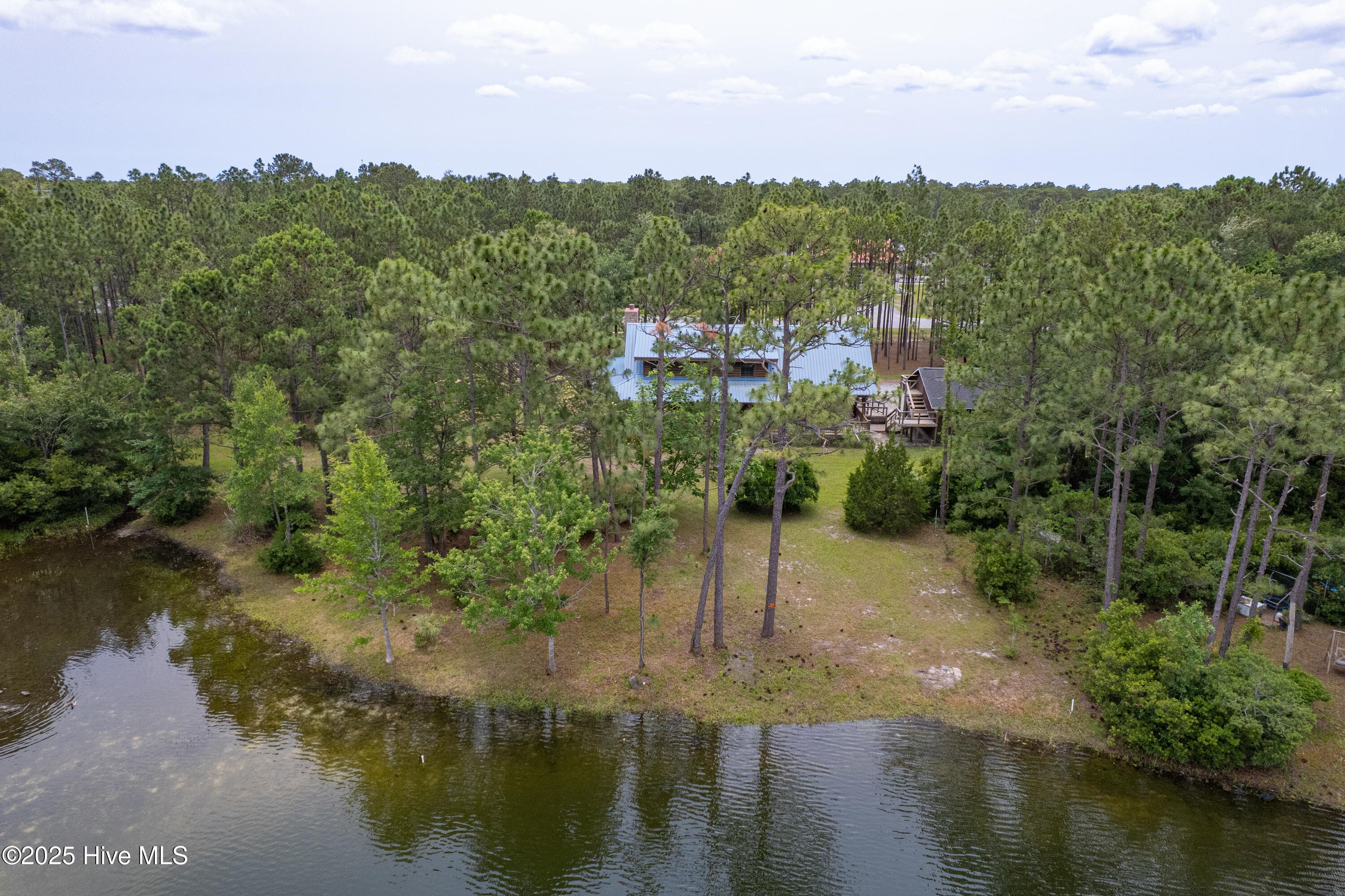 Single Family Residence at 949 Fifty Lakes Drive, Southport, NC 28461, photo 2 of 2