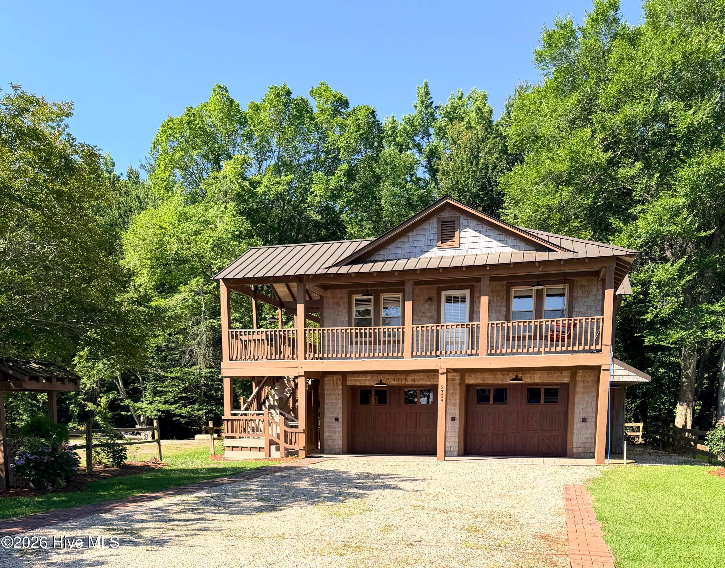 Single Family Residence at 2704 Waccamaw Shores Road, Lake Waccamaw, NC 28450, photo 2 of 56
