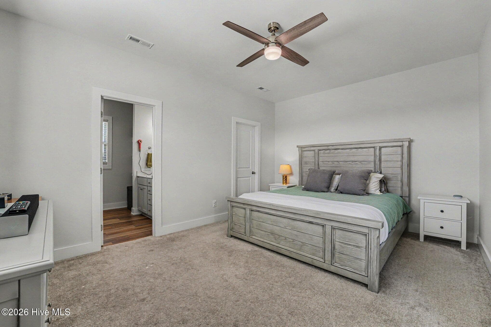 1st Floor master bedroom with ceiling fan - 176 Glenwood Place, Kenly, NC 27542