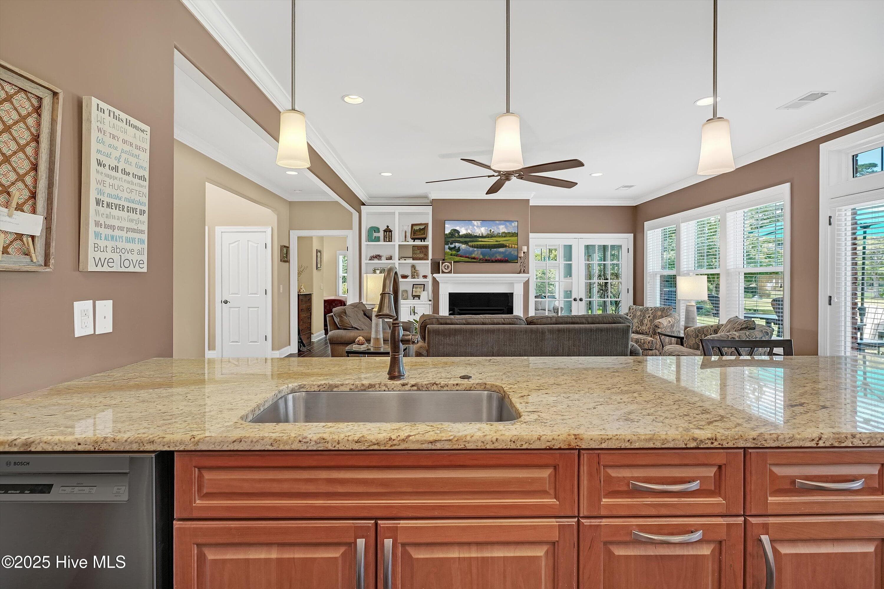 Looking from Kitchen into Great Room - 102 Reflection Court SW, Ocean Isle Beach, NC 28469
