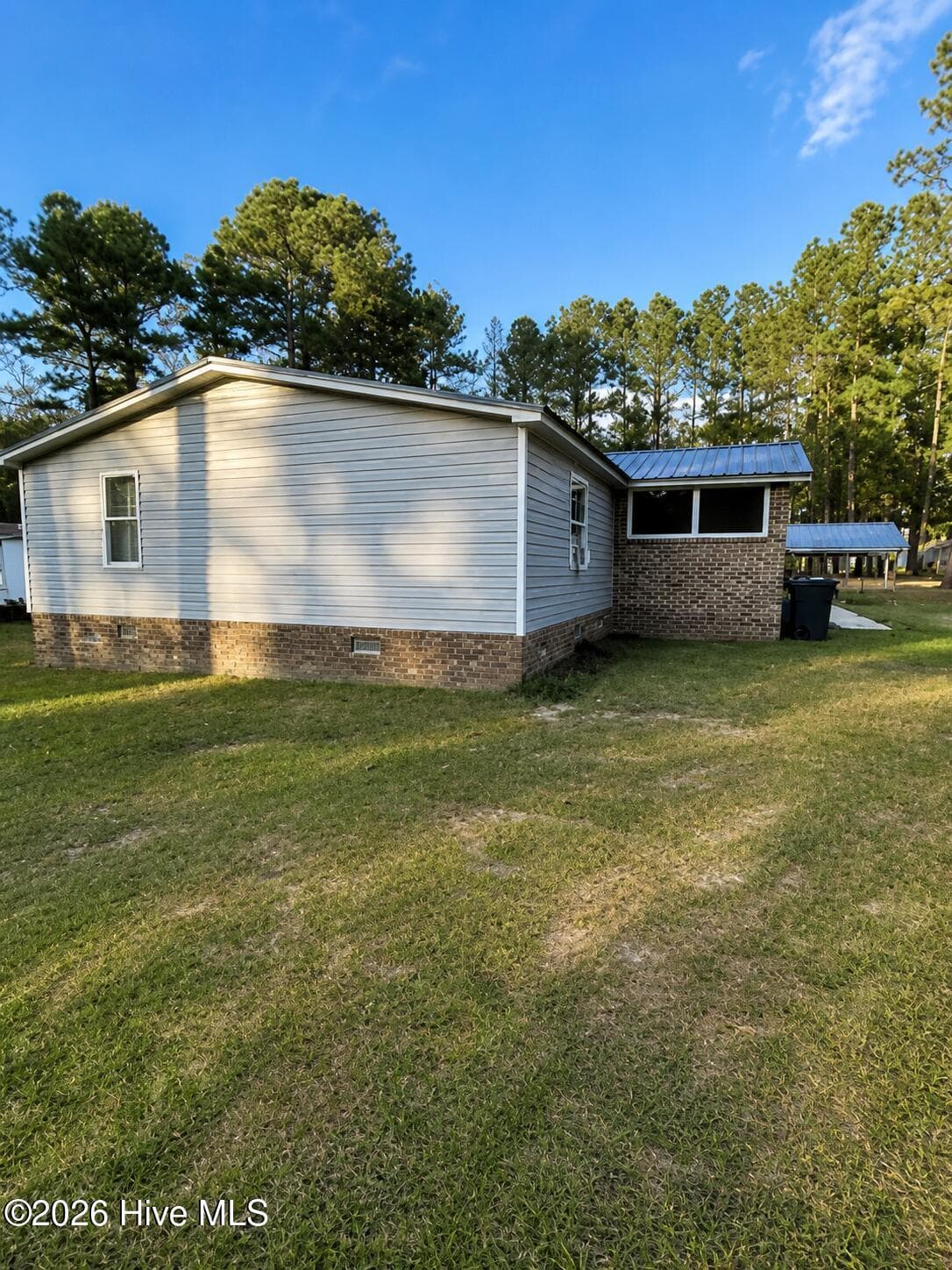 Manufactured Home at 8801 Johns Mill Road, Maxton, NC 28364, photo 3 of 14